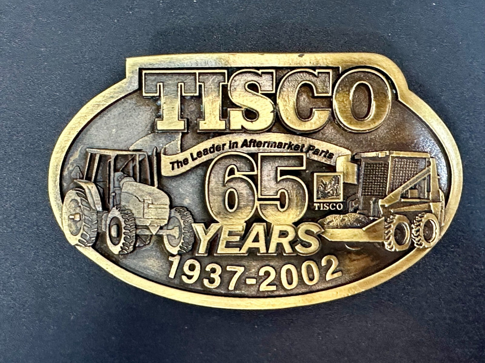 TISCO 65 Years 1937-2002 Series XIV The Leader in Aftermarket Parts Belt Buckle