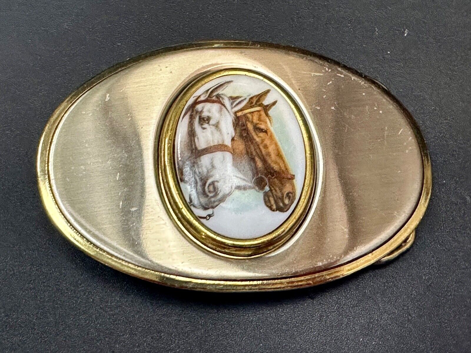 Two horse head picture in oval smooth gold tone Vintage Belt Buckle