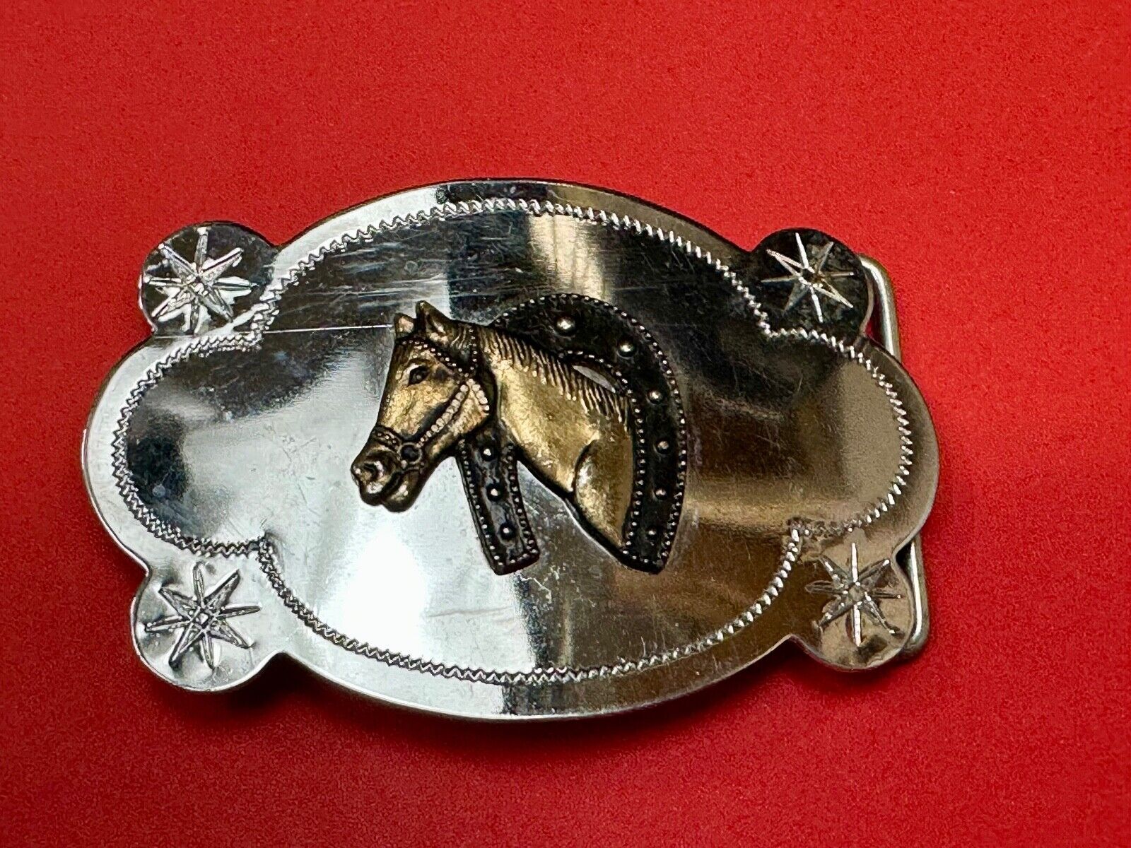 Vintage horse head in horseshoe cowboys cowgirls western belt buckle starbursts