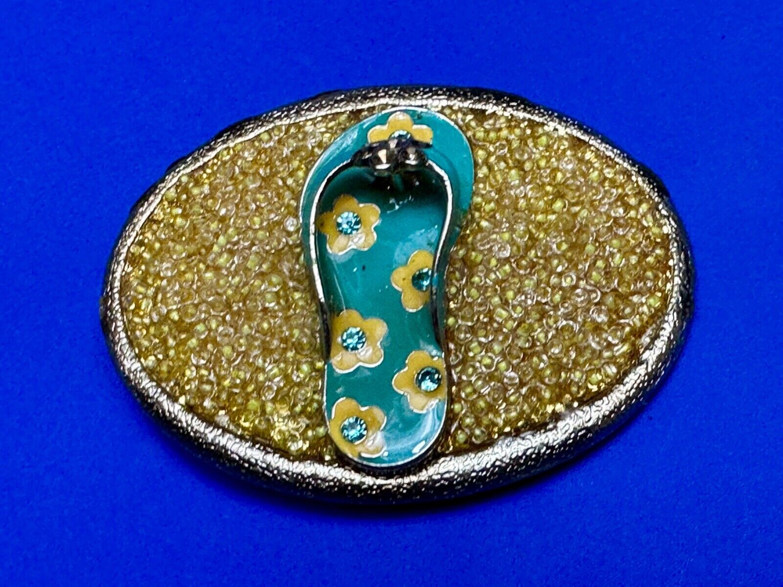 unique flip flop on sand - beach girls artisan belt buckle - missing stones?