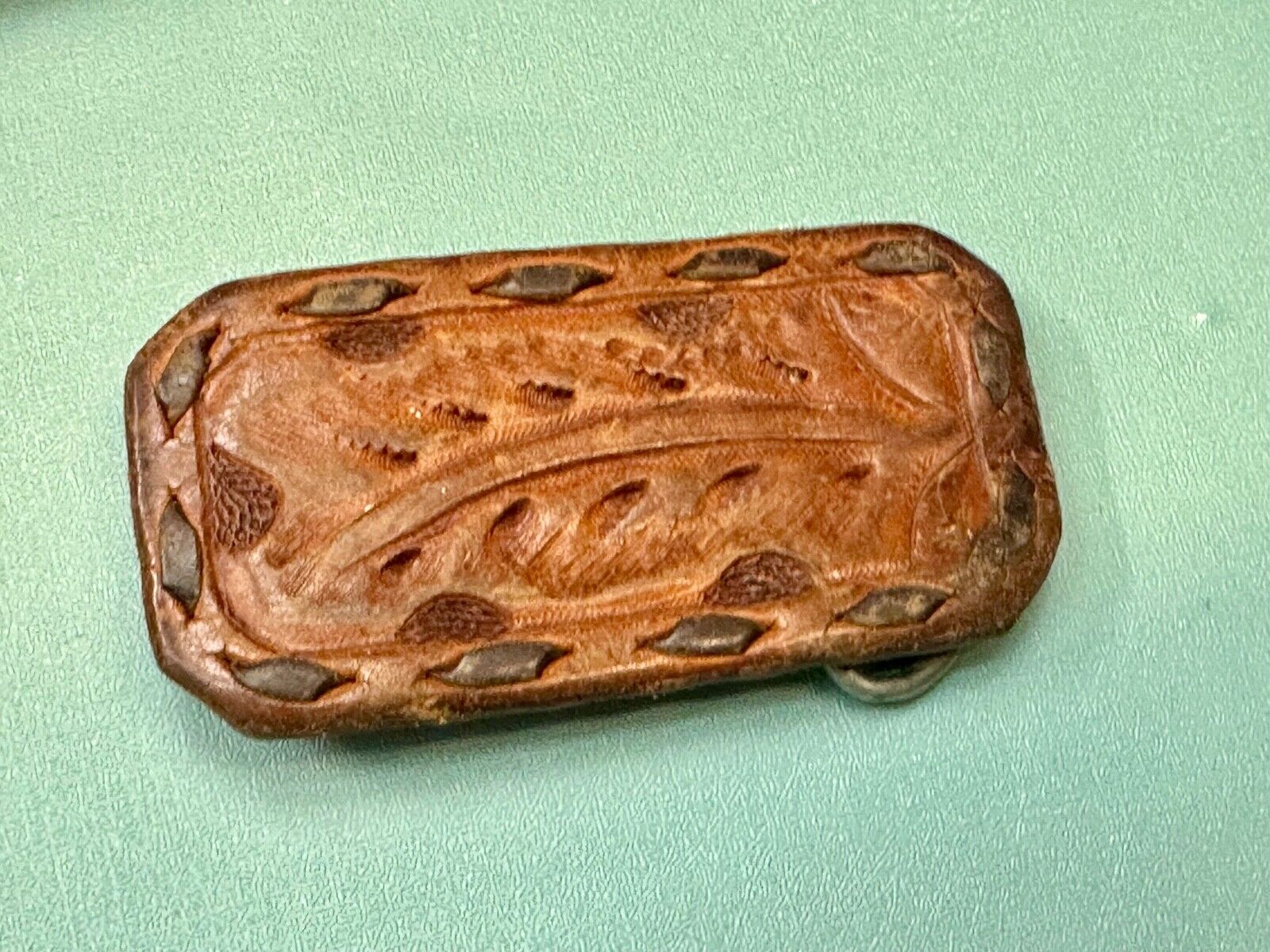 Vintage leaf pattern on stitched multi layer leather rectangular belt buckle