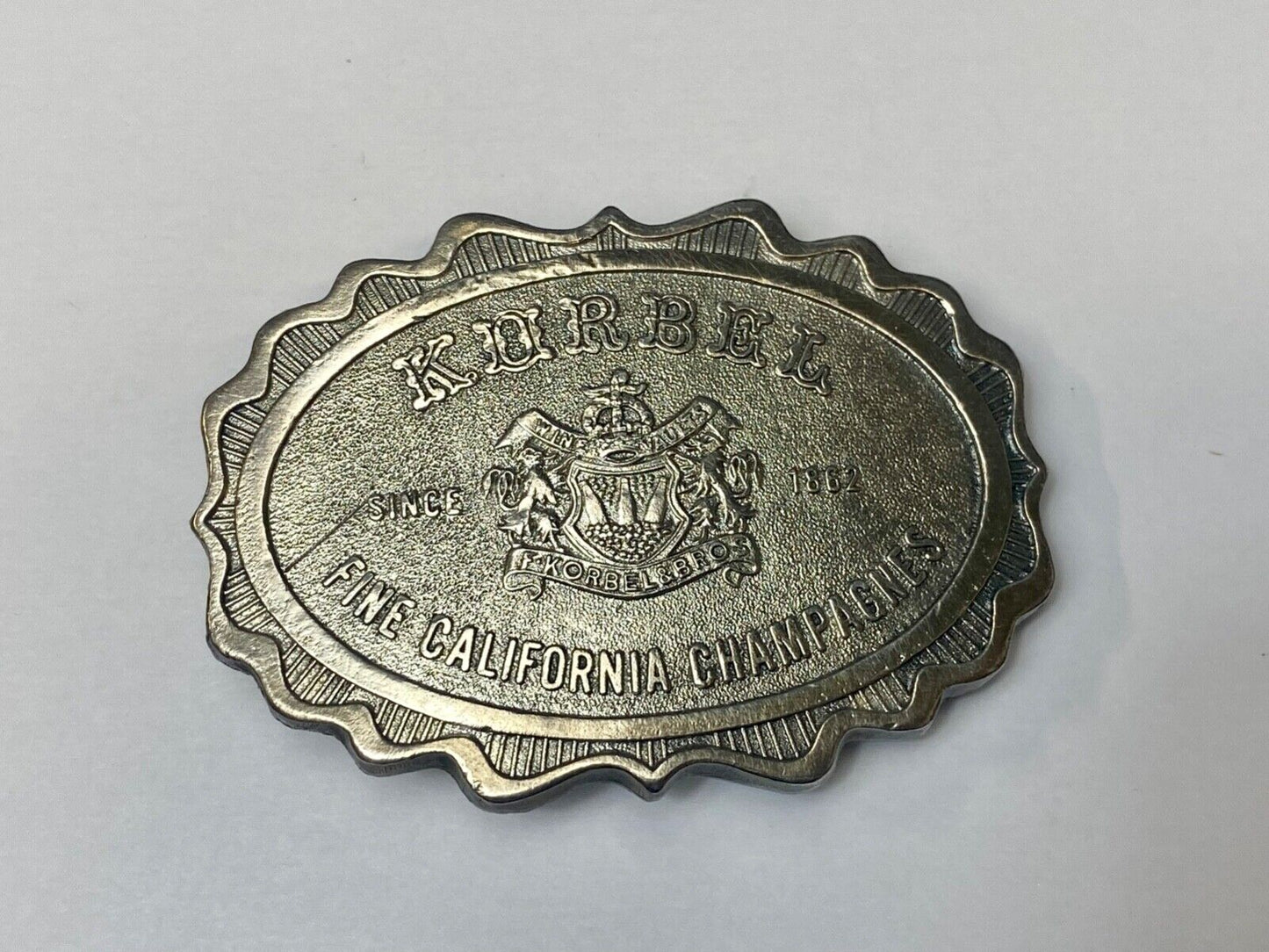 vintage Korbel Fine California champagne belt buckle by Wyoming Studio Art