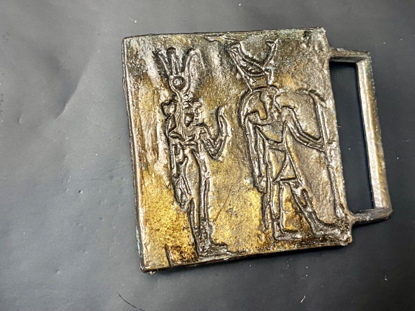 Two Tribal Warriors Indian figures?  accoral marked numbered belt buckle