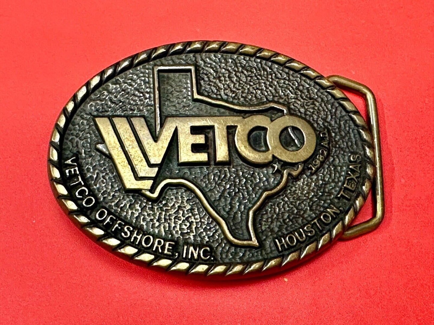 VETCO Houston Texas OffShore Inc animal health Vintage solid brass belt buckle