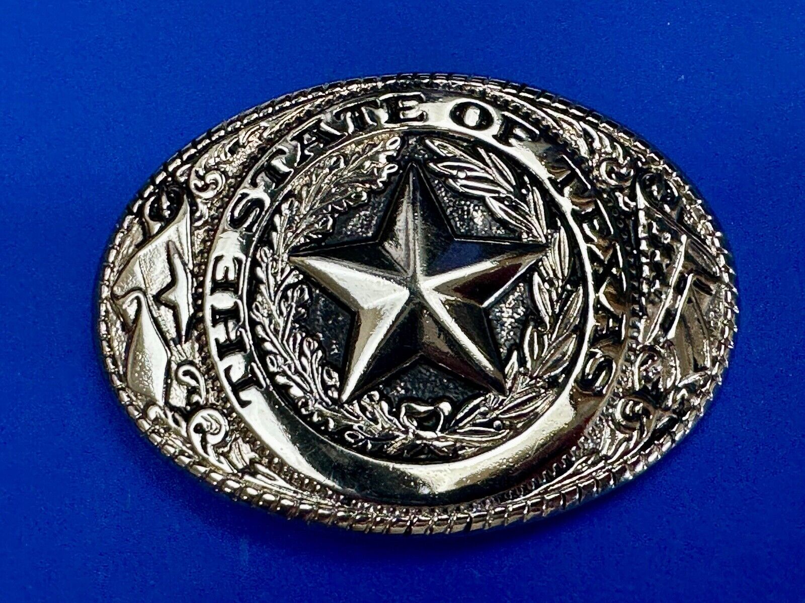 The Great State of Texas - Lone Star Flags seal light gold color belt buckle