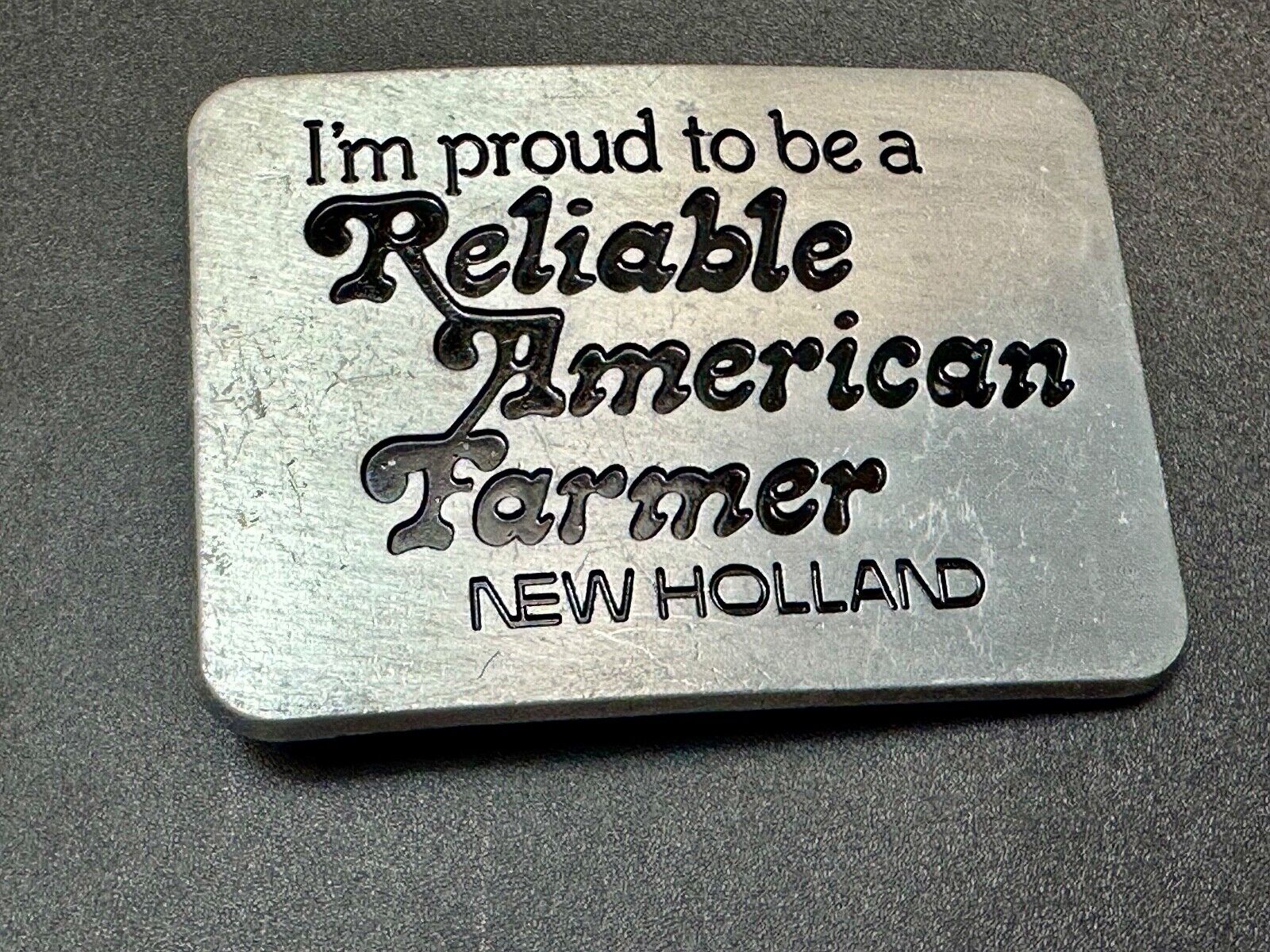 Vintage 1982 NEW HOLLAND I'm Proud to be a Reliable American Farmer Belt Buckle