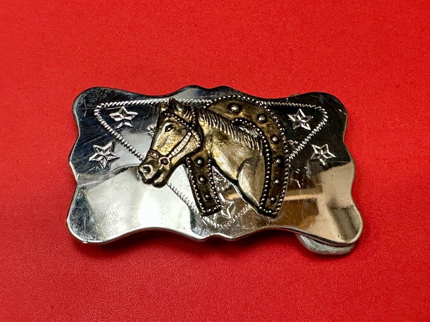 Vintage Horse head through horseshoe on reflective two tone belt buckle