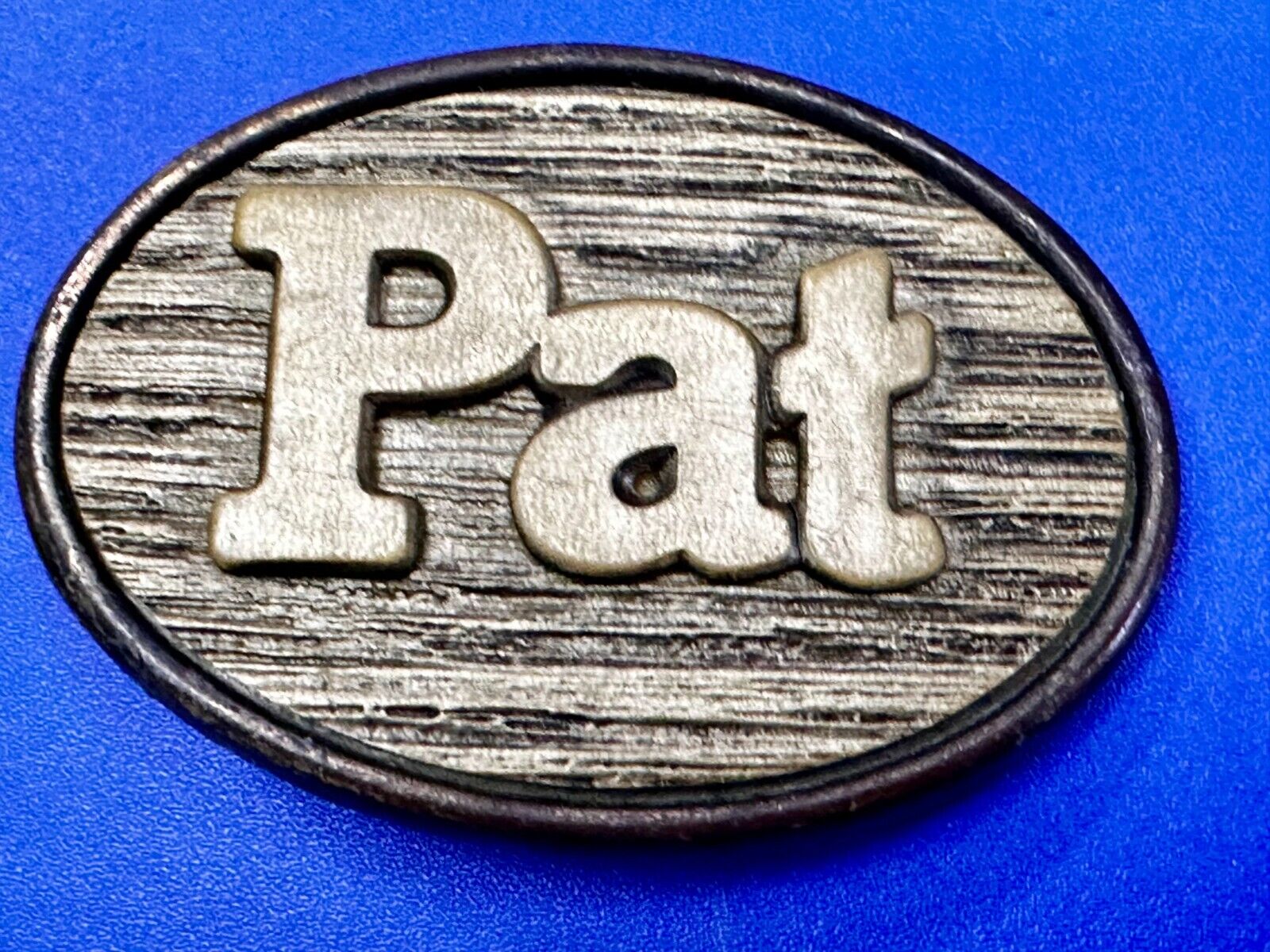 1970s  PAT Name - Custom Wood Grain Metal Oden USA Personalized Belt Buckle