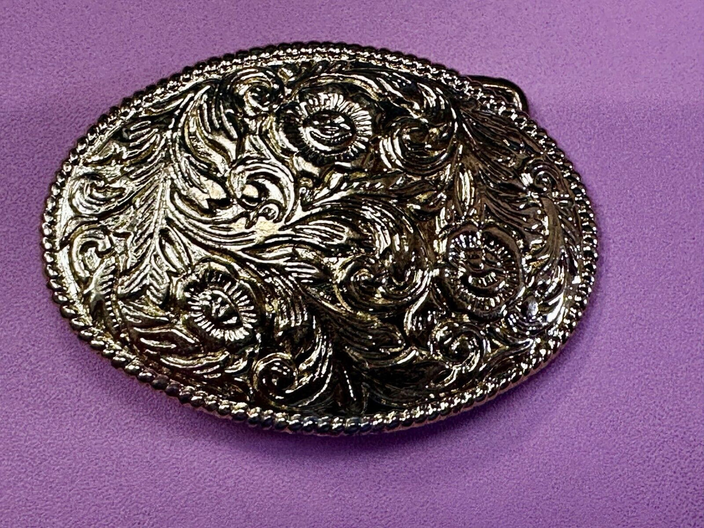 Vintage gold tone western flower swirl design belt buckle