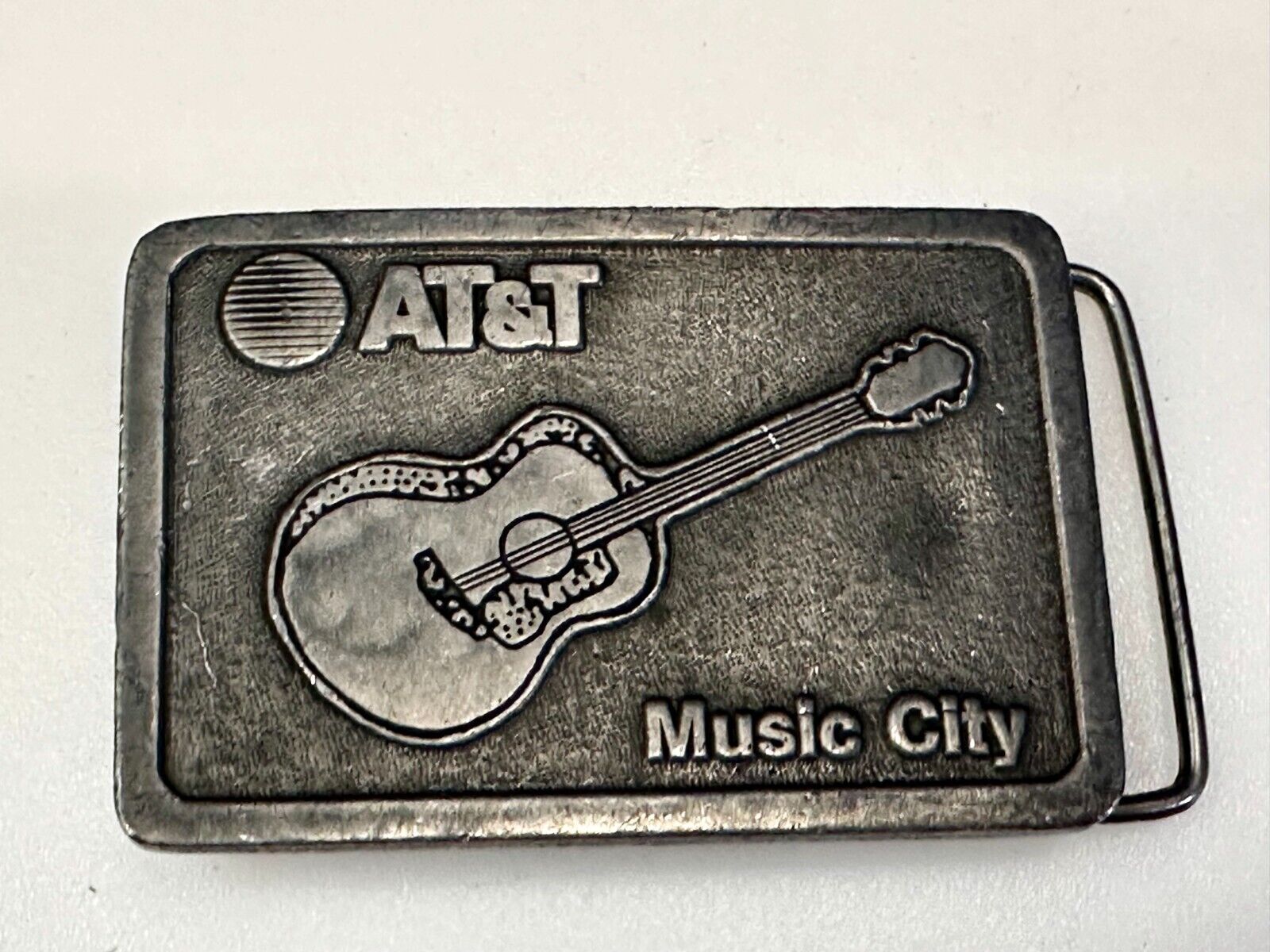 AT&T Nashville Music City Communications Acoustic Guitar Pickers Belt Buckle