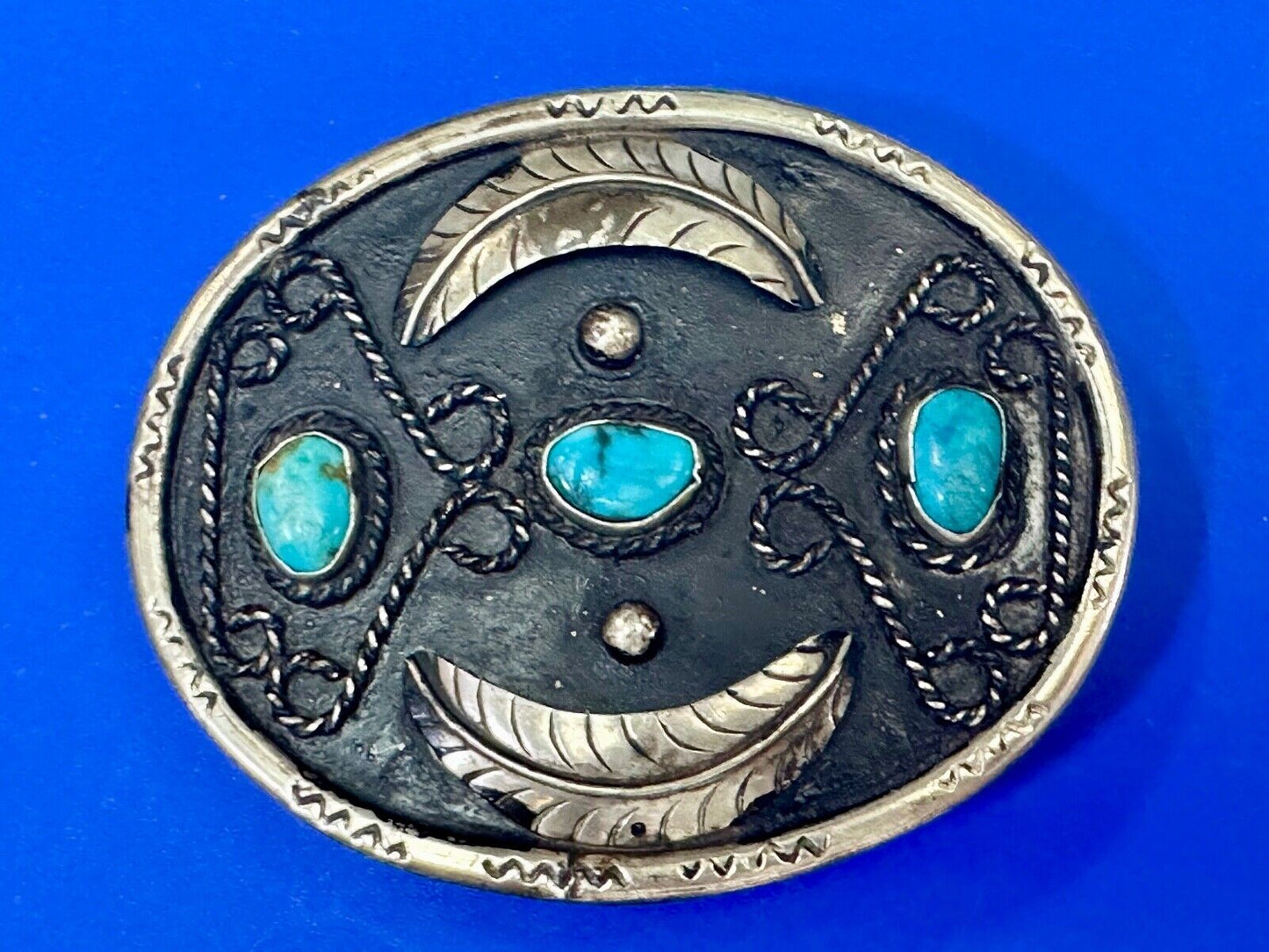 Turquoise stones raised feathers vintage belt buckle marked Sterling 0925 Mexico