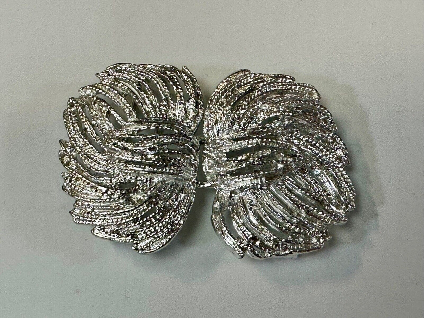 Two piece interlocking sea leaf brushed pattern see through pattern belt buckle