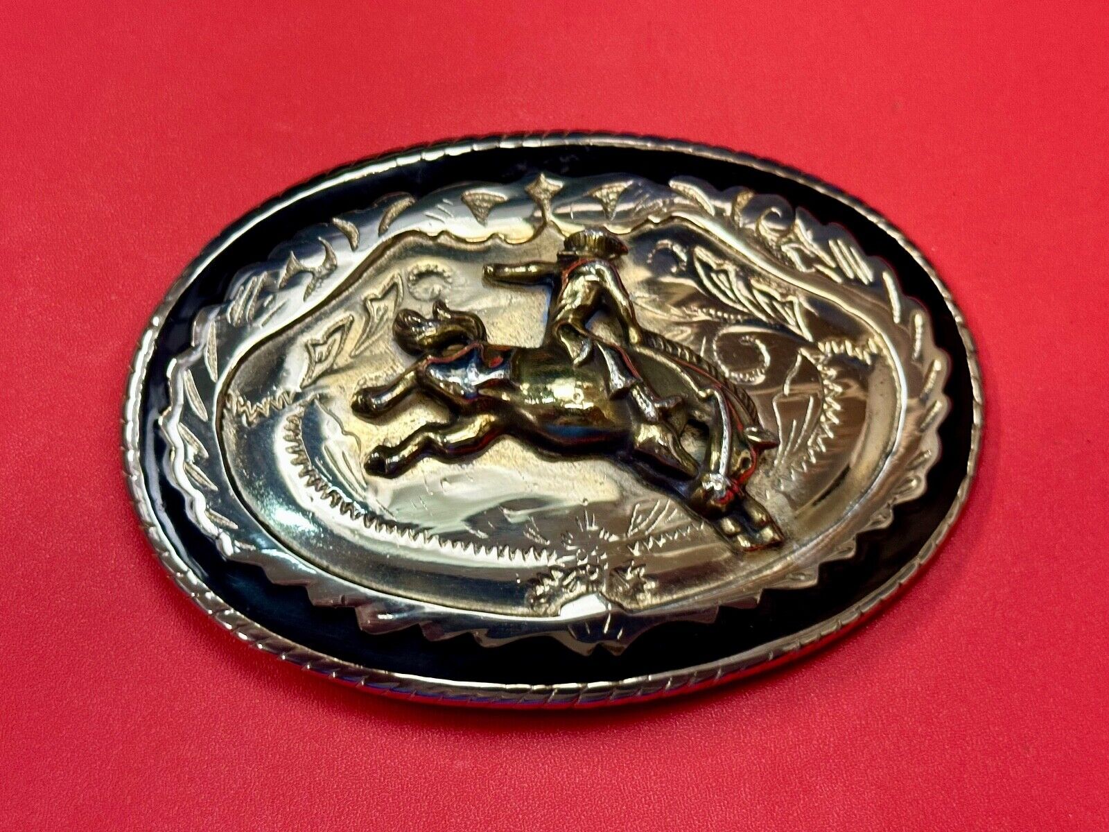 Beautiful Cowboy Saddle Bronc western black silver gold color belt buckle