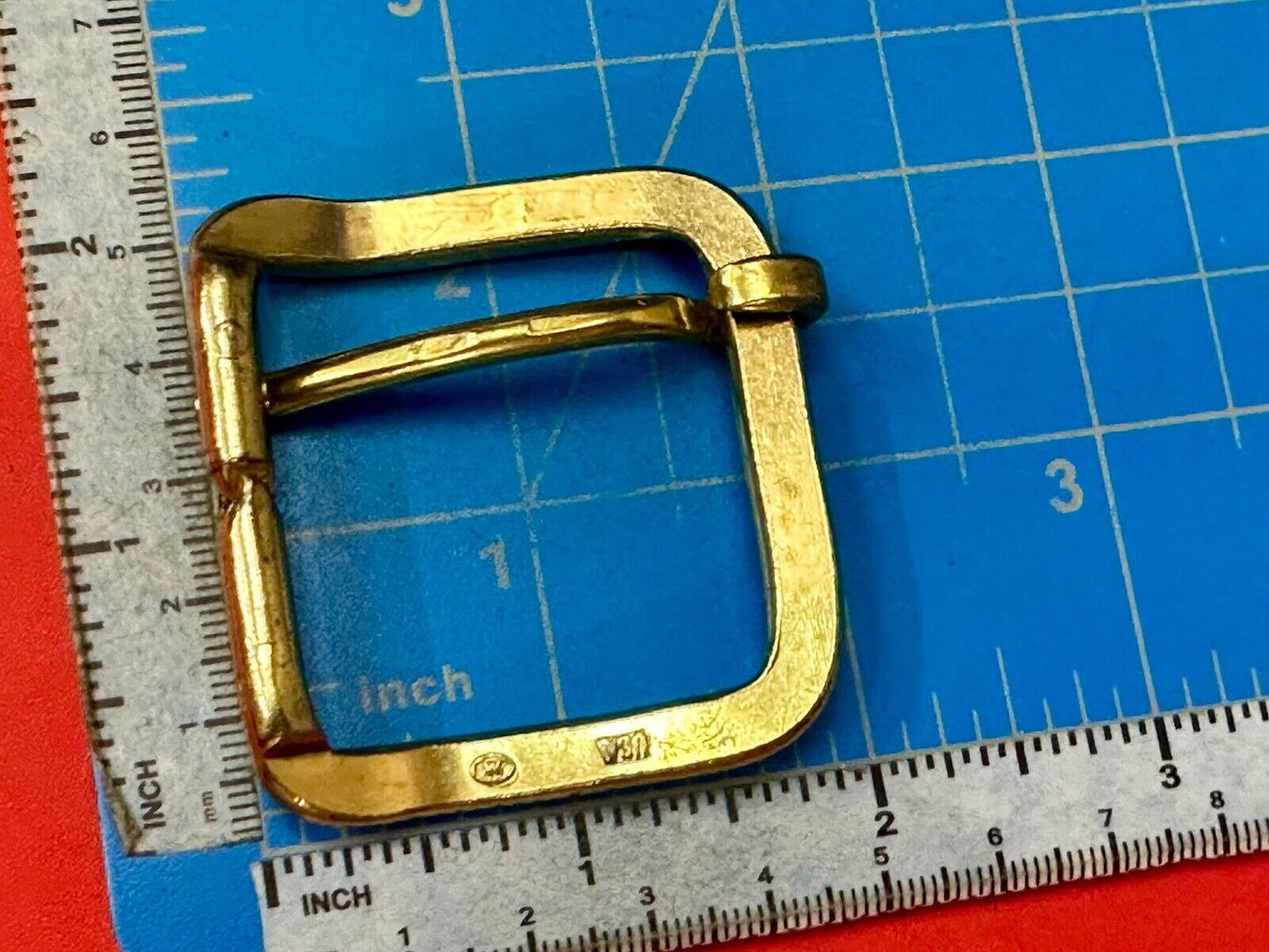 Vintage  replacement belt buckle marked W with unique angle