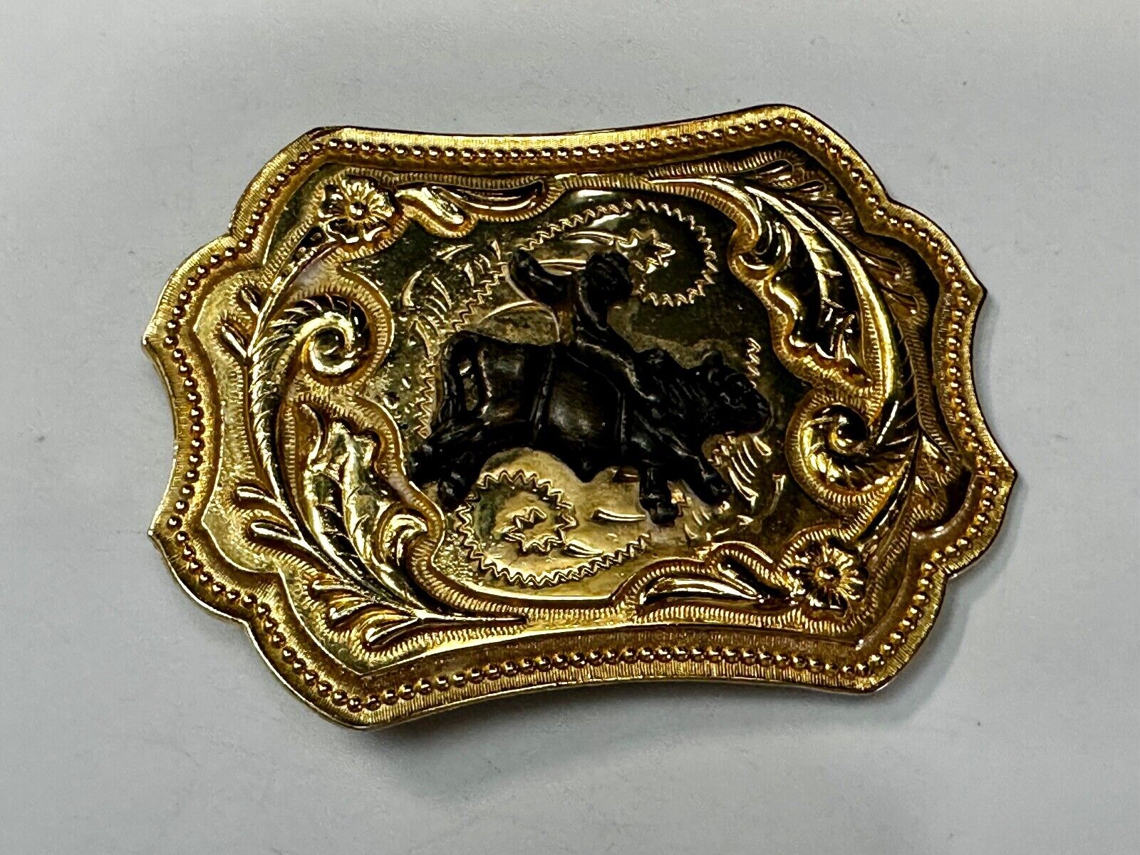 Vintage Cowboy Saddle Bronc western two tone flower swirl belt buckle