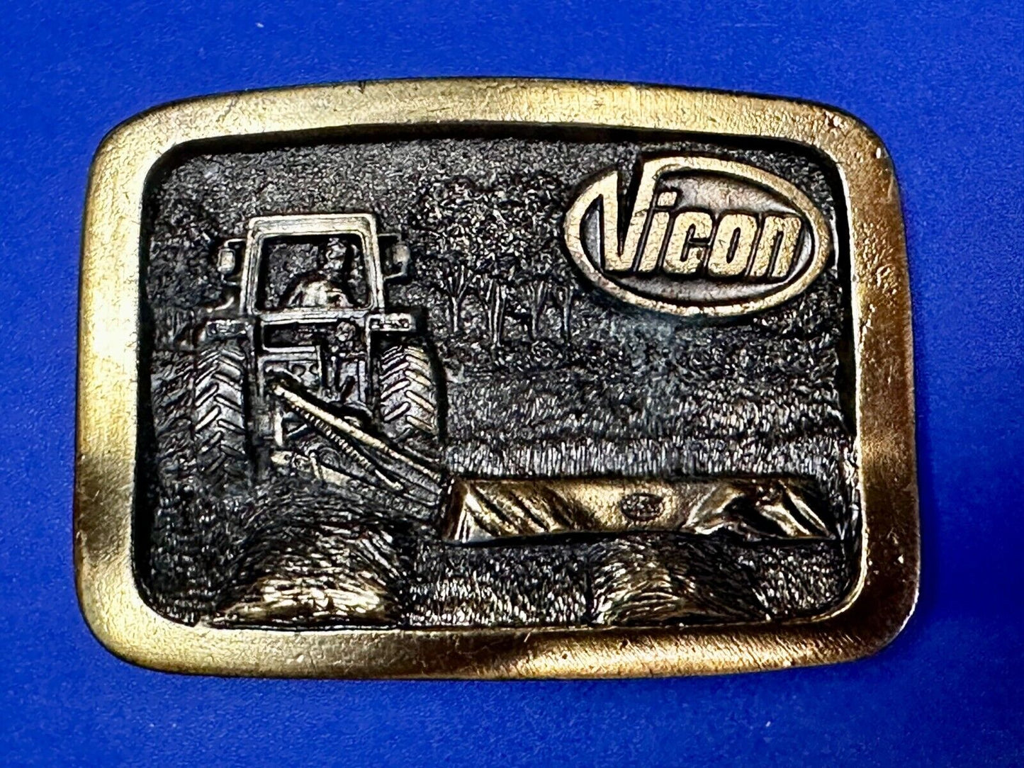 Vicon Disk Mower Tractor Promotional Belt Buckle by Premium Specialties