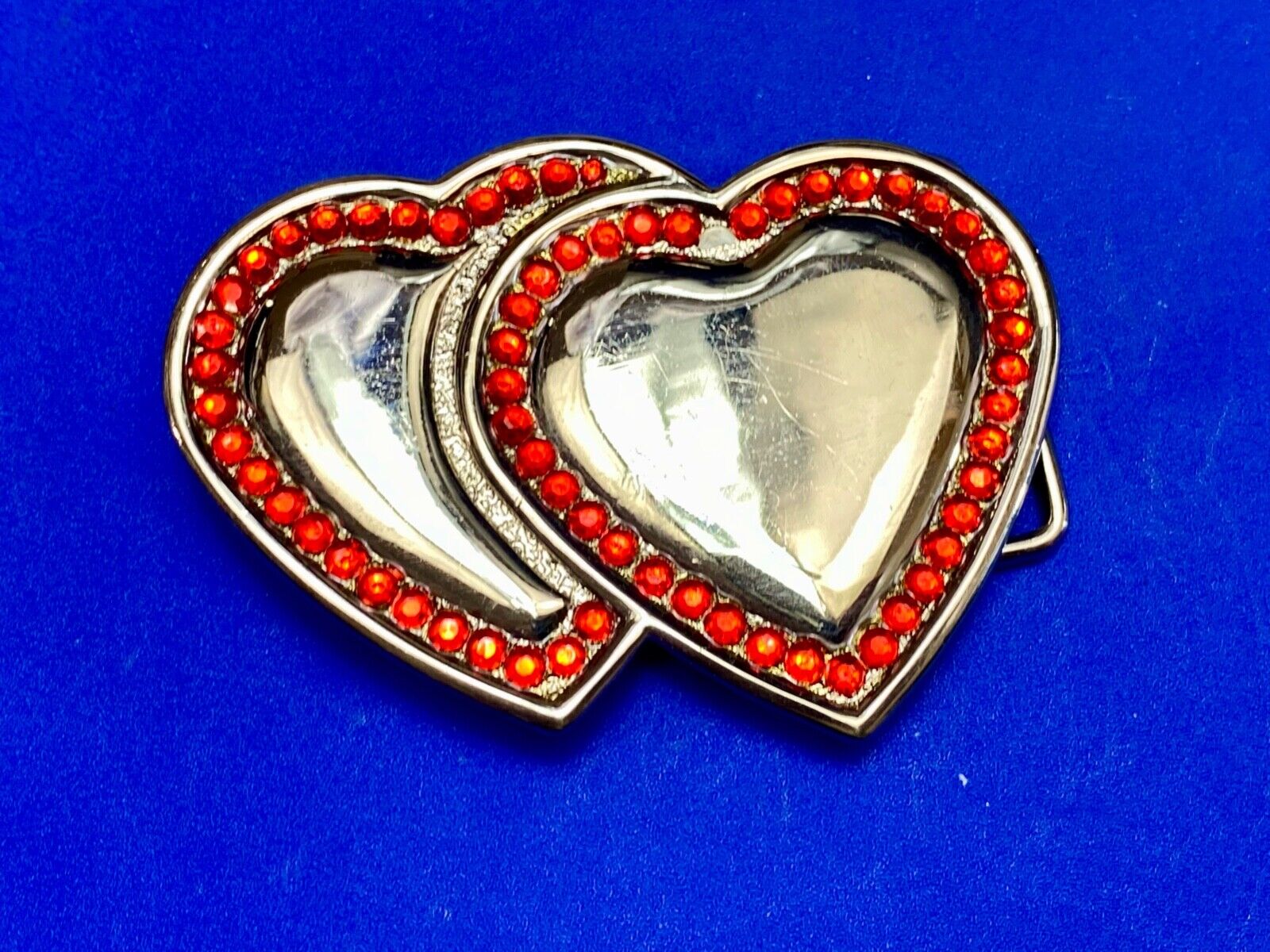 Two Jeweled Hearts Red Rhinestone outlining silver tone cutout belt buckle