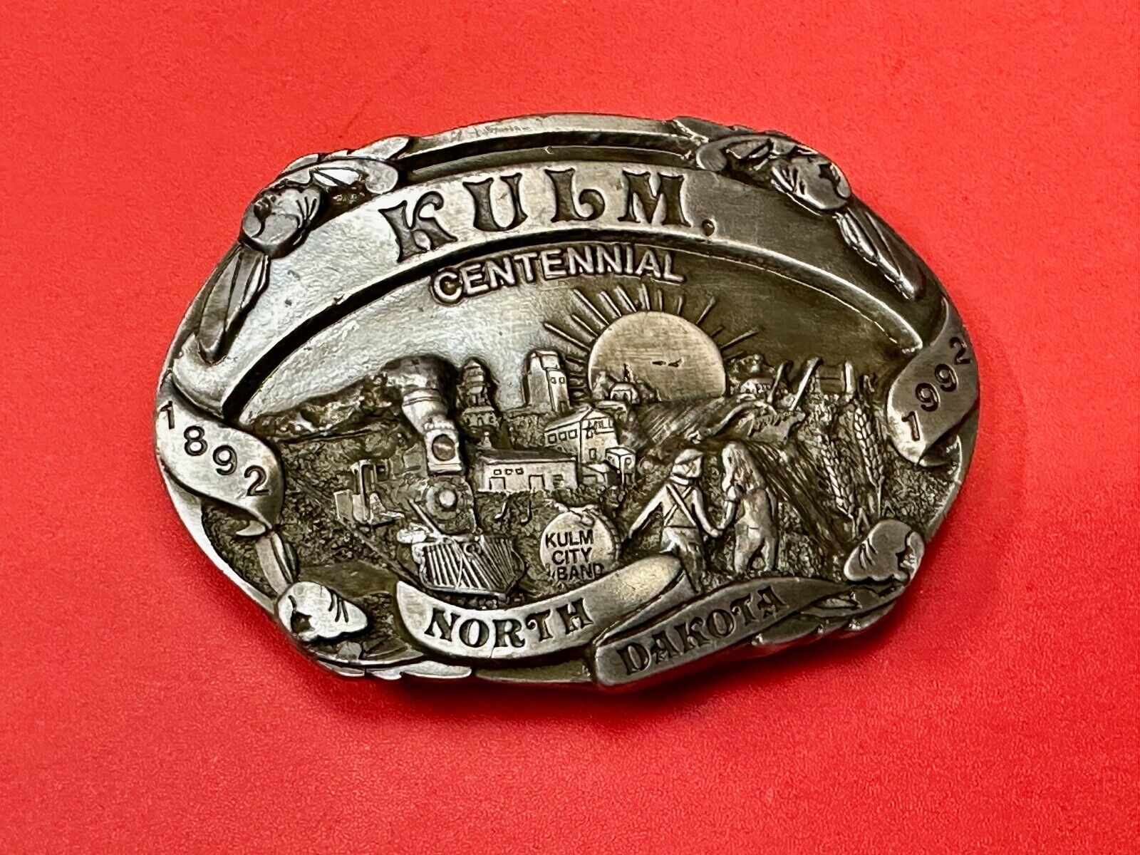 Vintage KULM North Dakota commemorative belt buckle by DART inc.