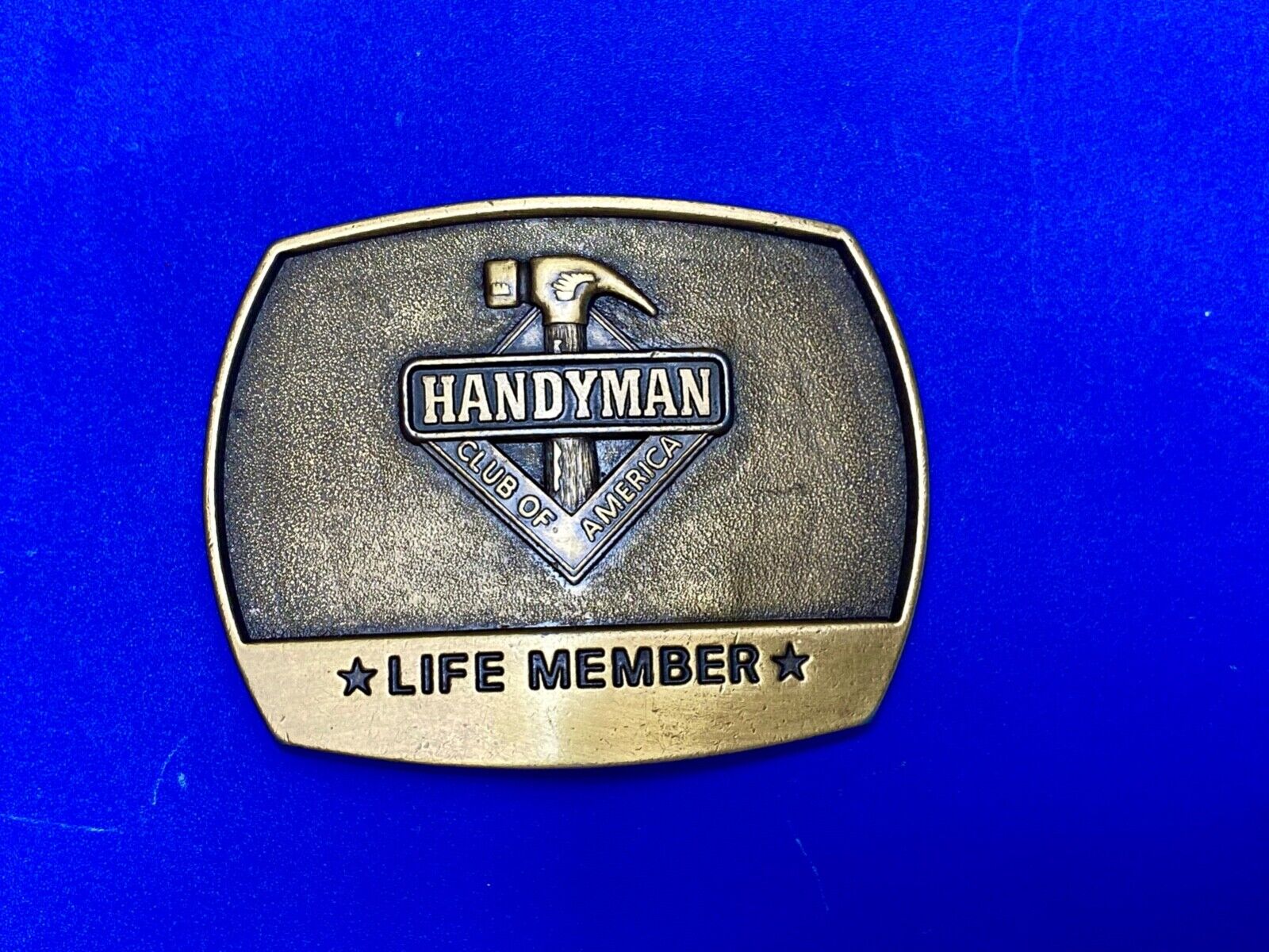 vintage handyman club of America Hammer Ruler- life member belt buckle