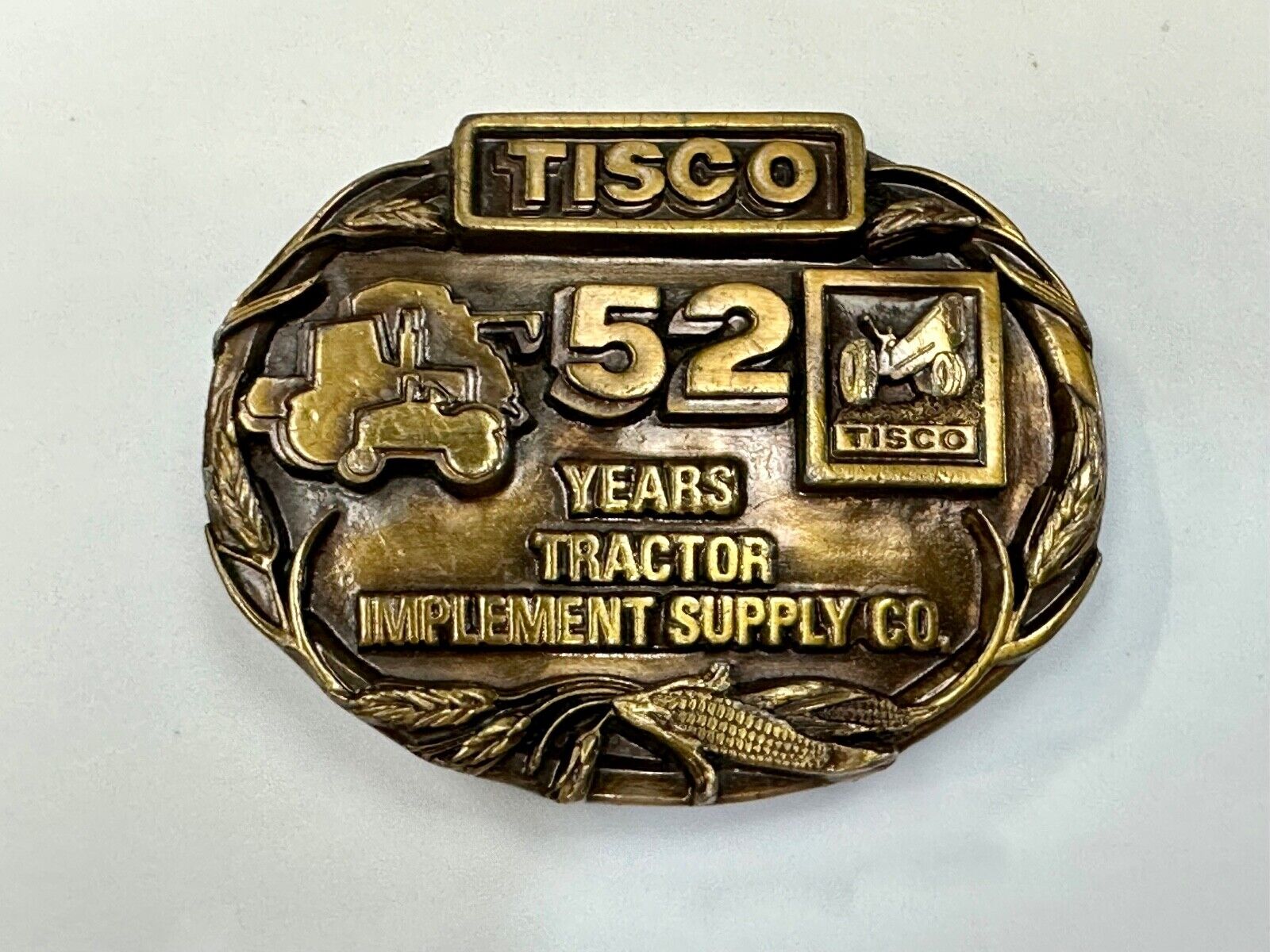 TISCO 52 years commemorative belt buckle  Tractor Implement Supply