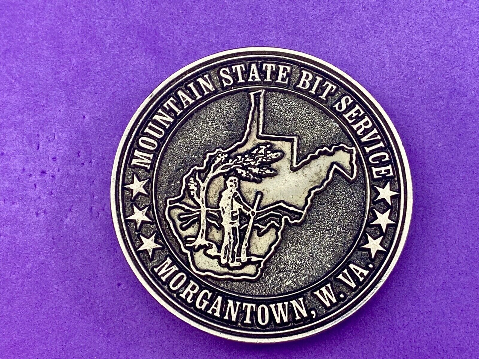 Vintage  Mountain State Bit Services Morgantown W.V. round belt buckle  by Lewis