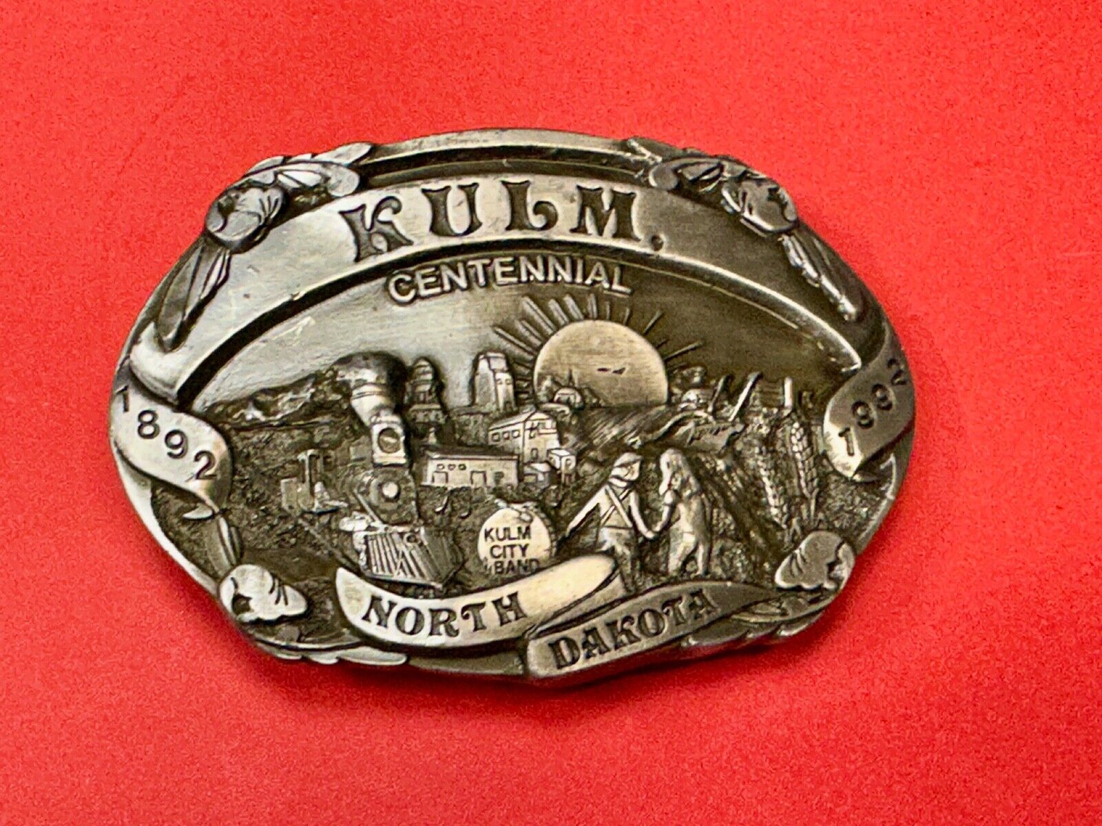 Vintage KULM North Dakota commemorative belt buckle by DART inc.