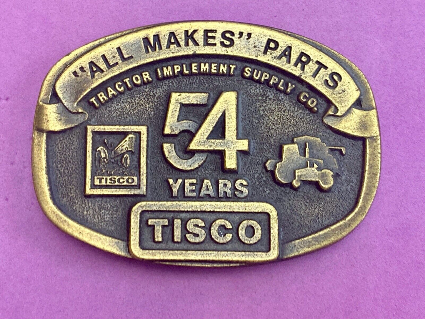 54 years Tisco Tractor Implement Supply Spec Cast Brass Belt Buckle series 2