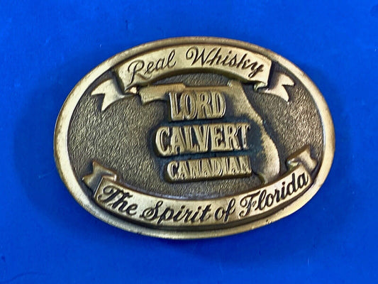 Vintage Lord Calvert Canadian Real Whisky.  Spirit Of Florida Belt Buckle 
