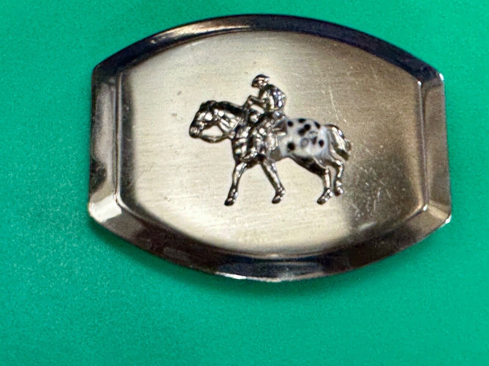 Vintage Horseback Riders cowboys belt buckle with black & white enamel accents