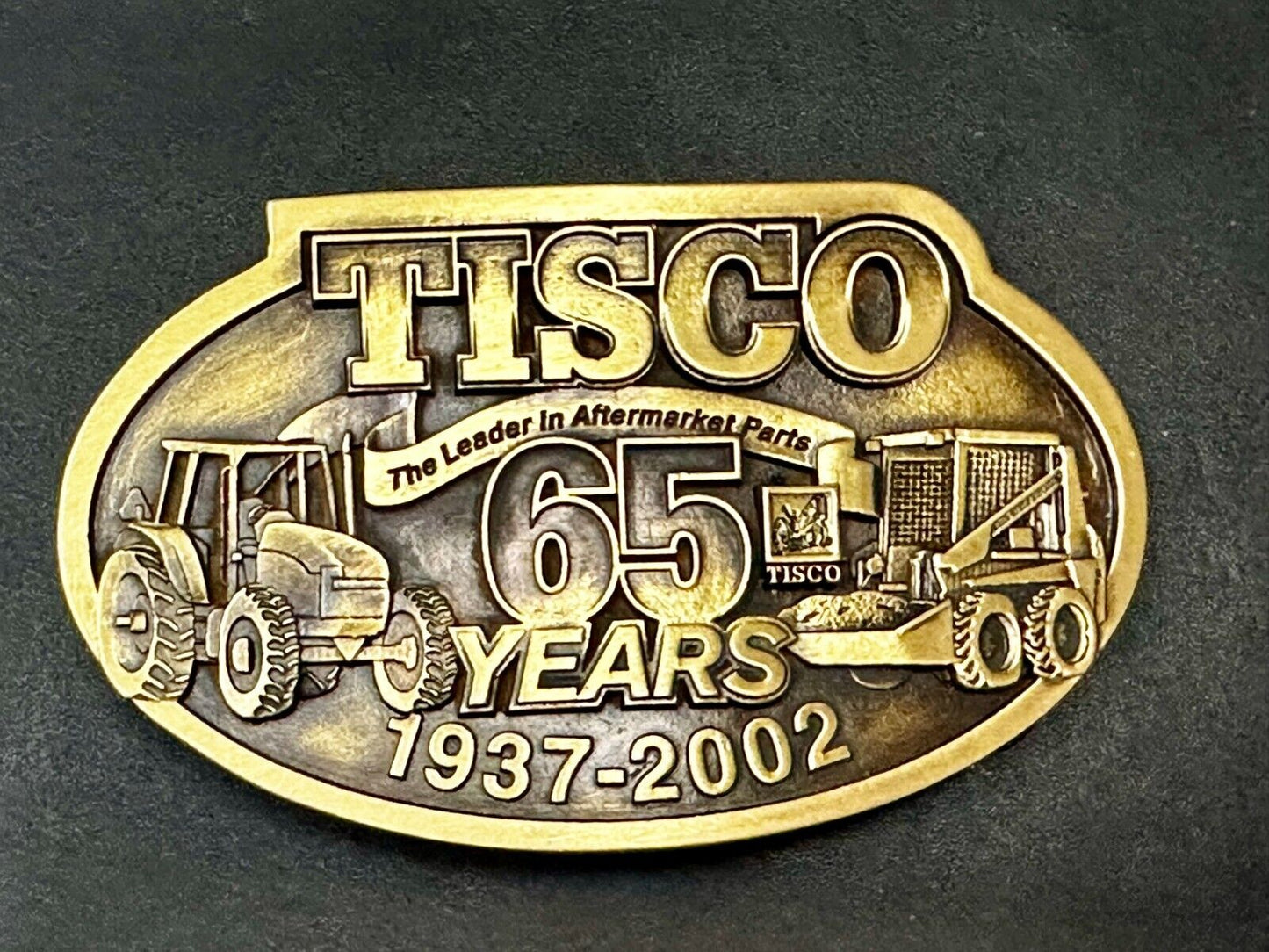 65 Years TISCO 2002 Tractor Implement Supply company NOS Belt Buckle