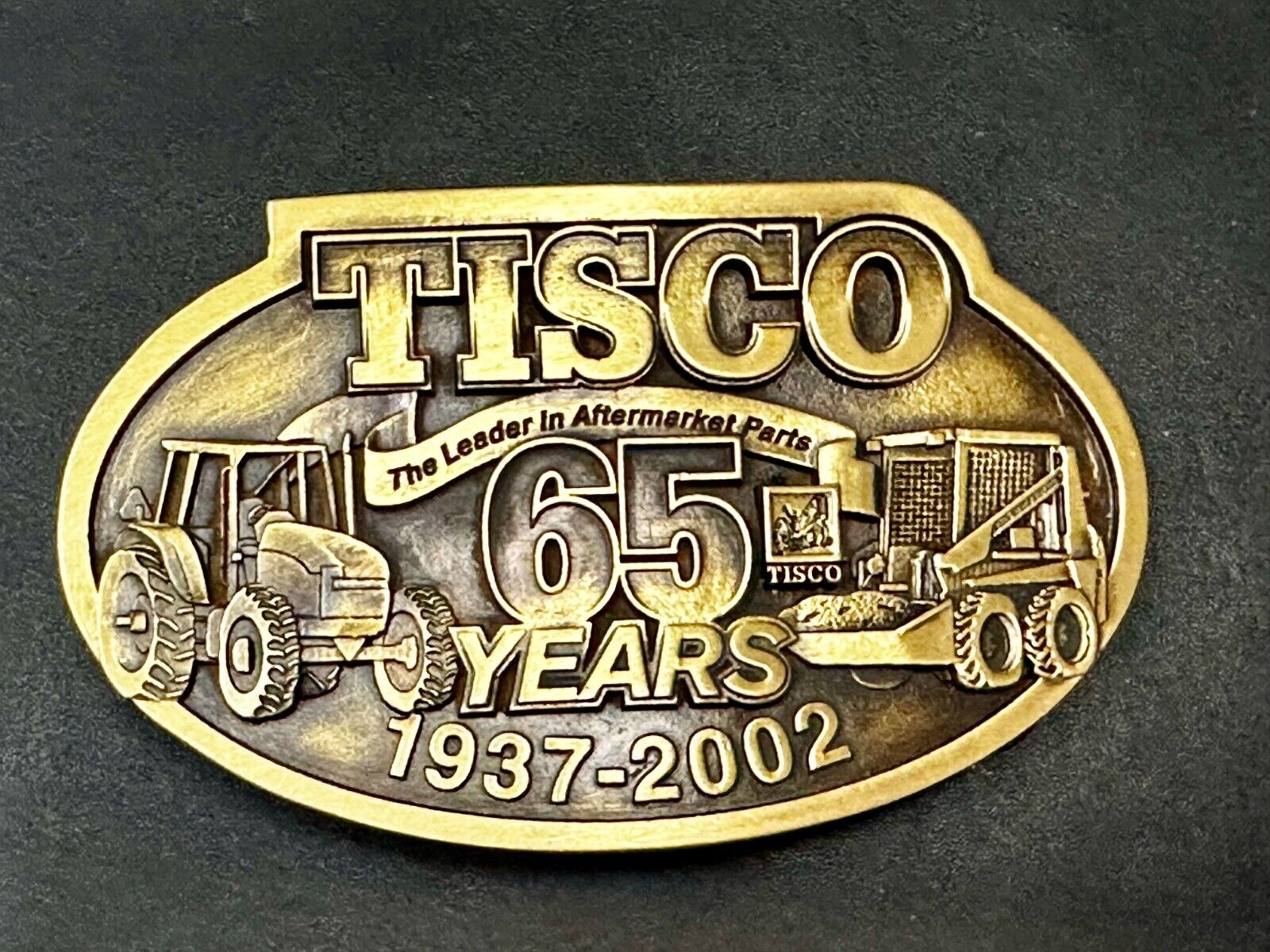65 Years TISCO 2002 Tractor Implement Supply company NOS Belt Buckle
