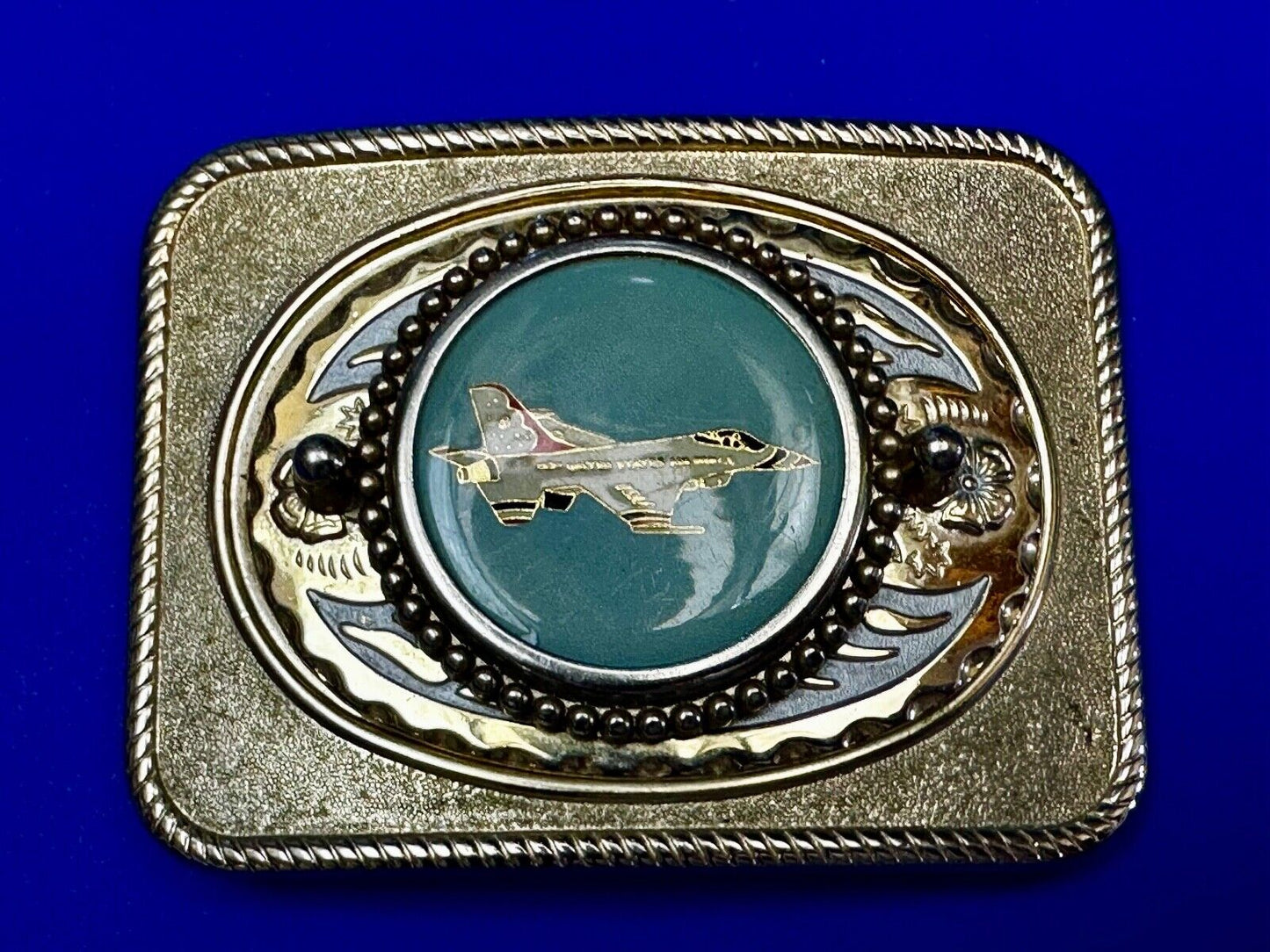 Us Air Force Fighter Jet as centerpiece in western Belt Buckle - or dollar coin