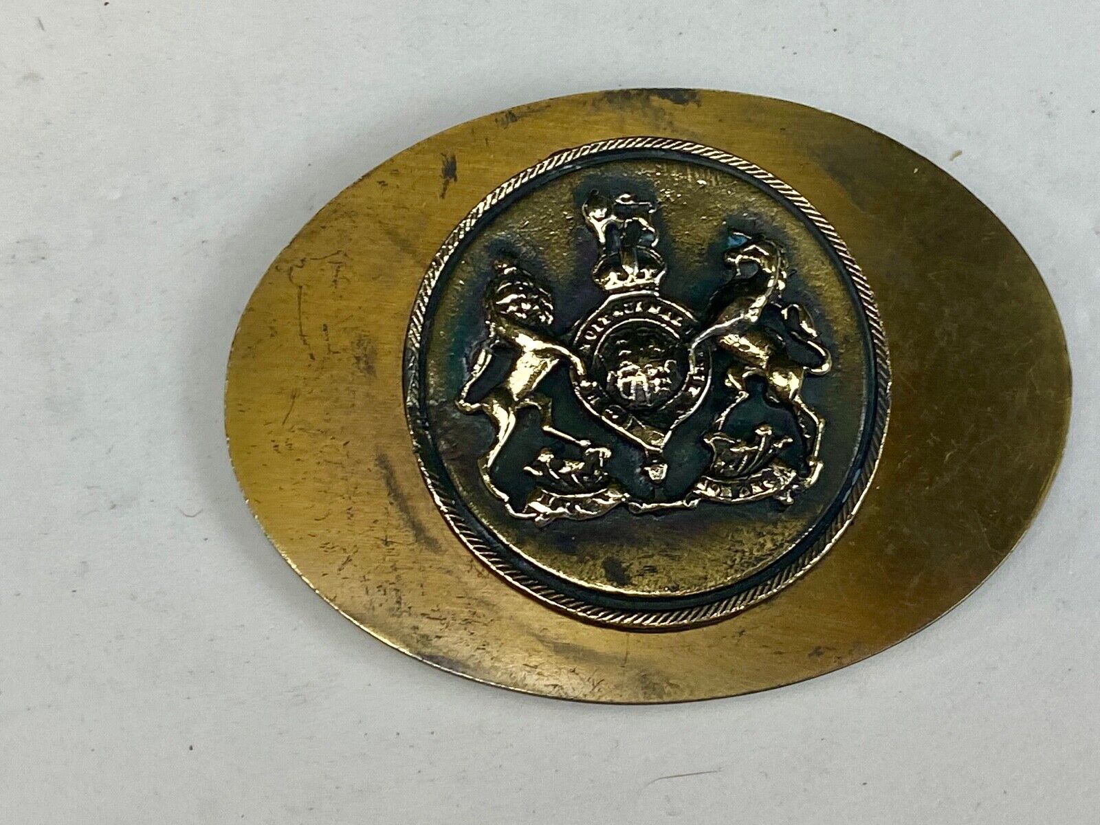 Unknown to me - family crest? Wild horses belt buckle 