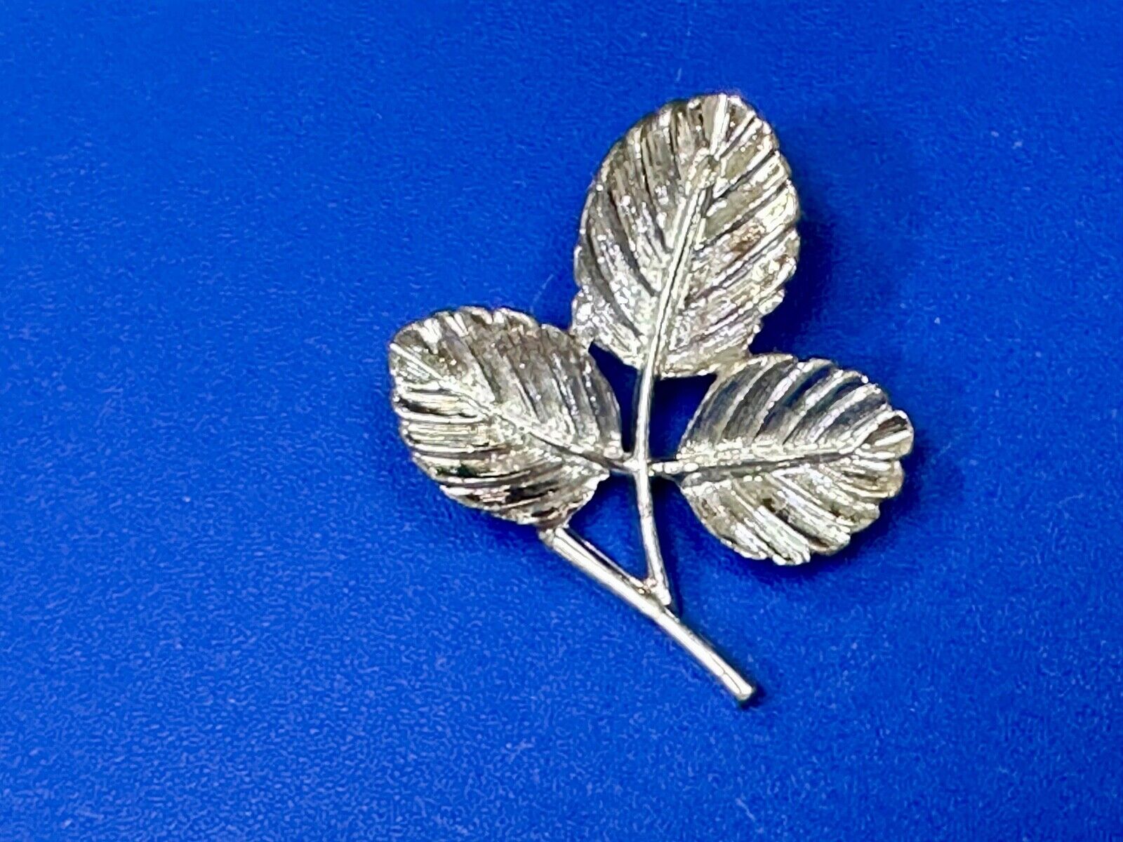 Three Leaf cutout Sarah Coventry signed silver tone brooch pin