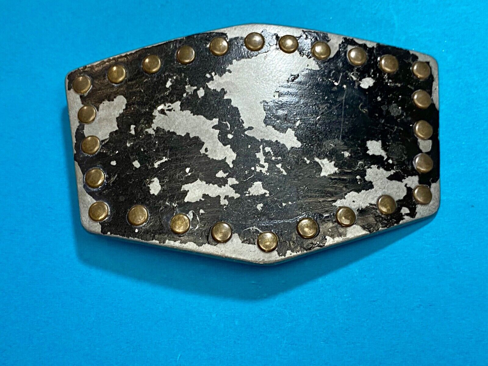 used metal studded black faded paint belt buckle for your craft or project