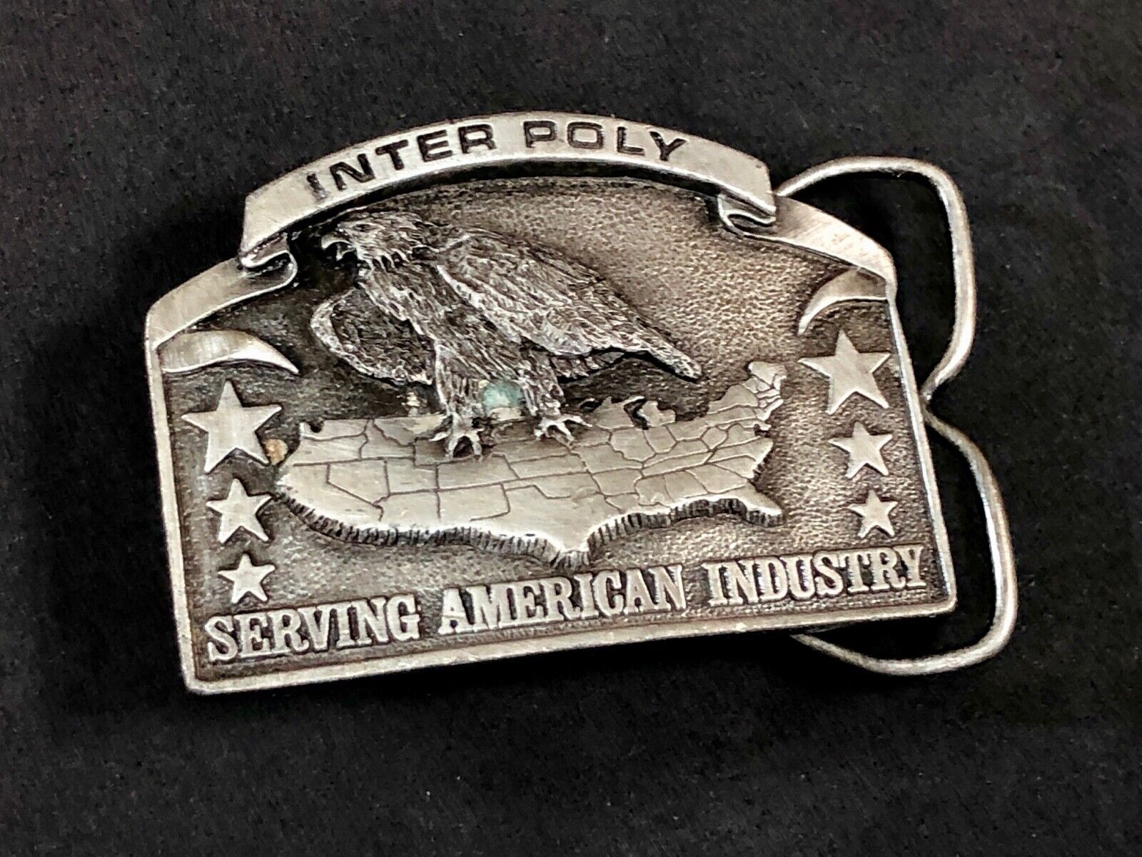 Vintage 1981 Bergamot Inter Poly Serving Americas Industry belt buckle 