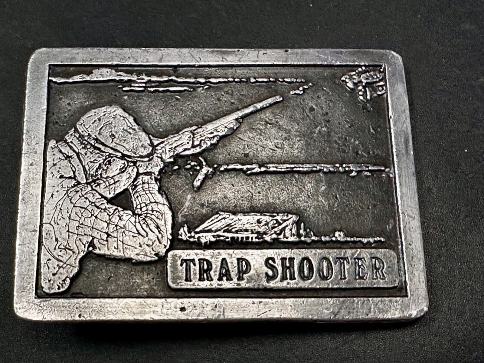 Trap Shooter Shooting Positions Gun Rifle Sports Vintage 1976 Belt Buckle by NS
