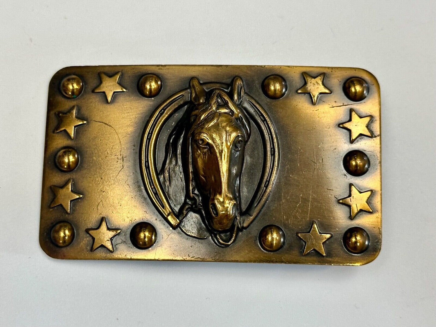 Vintage Horse head belt buckle with stars and circles boarder