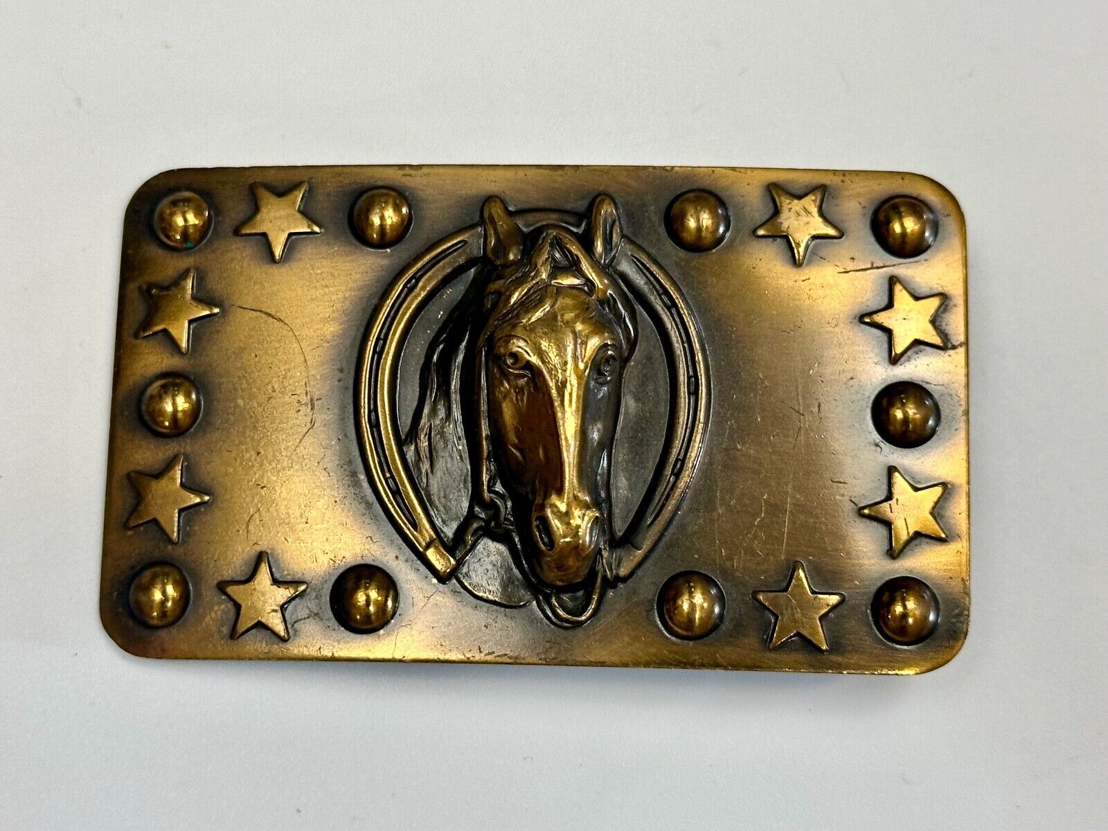 Vintage Horse head belt buckle with stars and circles boarder