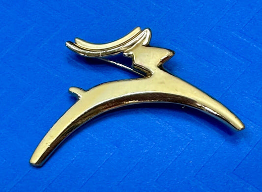 Abstract gold tone running deer - Vintage Christmas Holliday Brooch by AJC