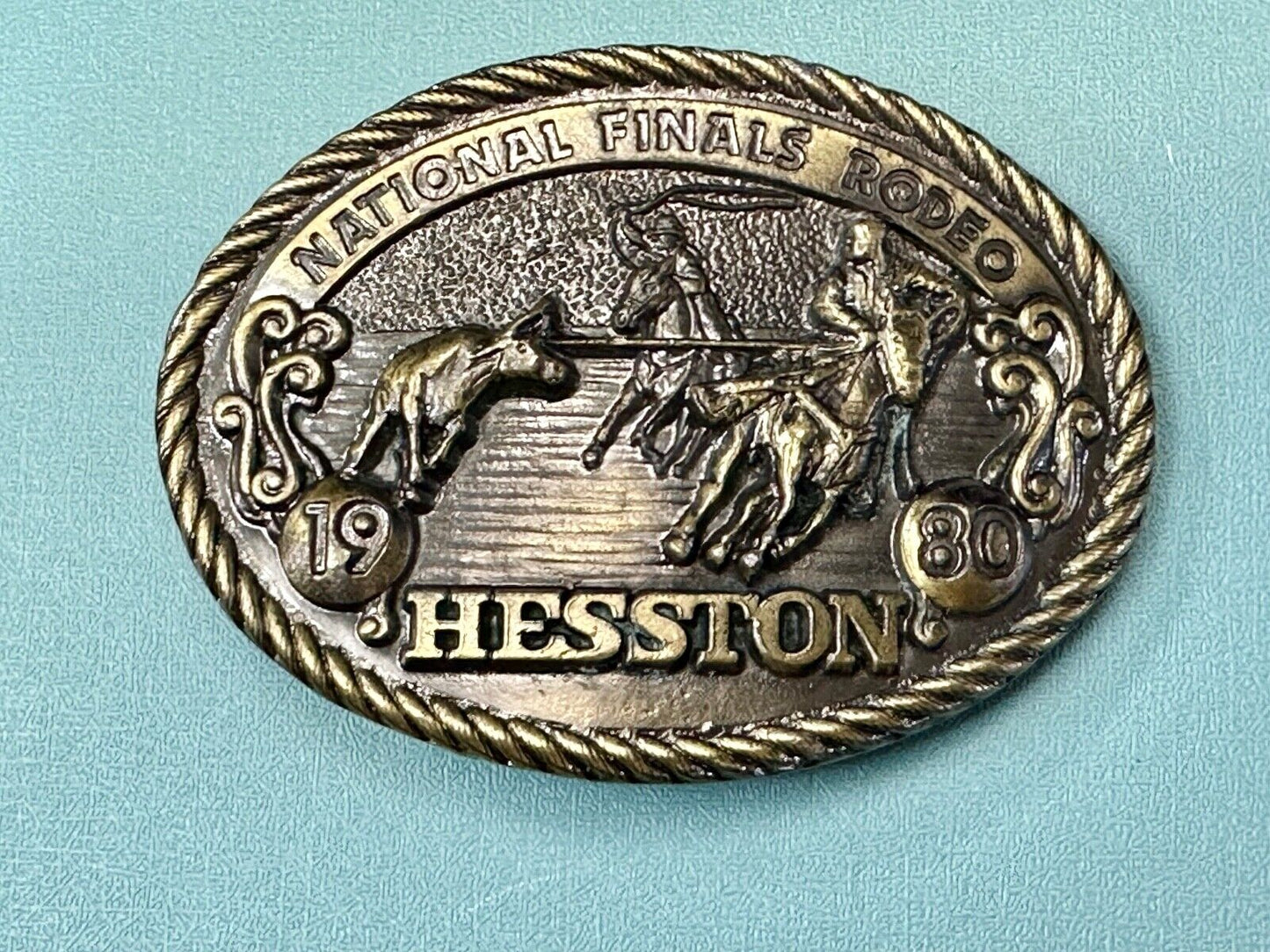 1980 NFR Rodeo Vintage Hesston Cow Roping Steer Wrestling Cowboy belt buckle