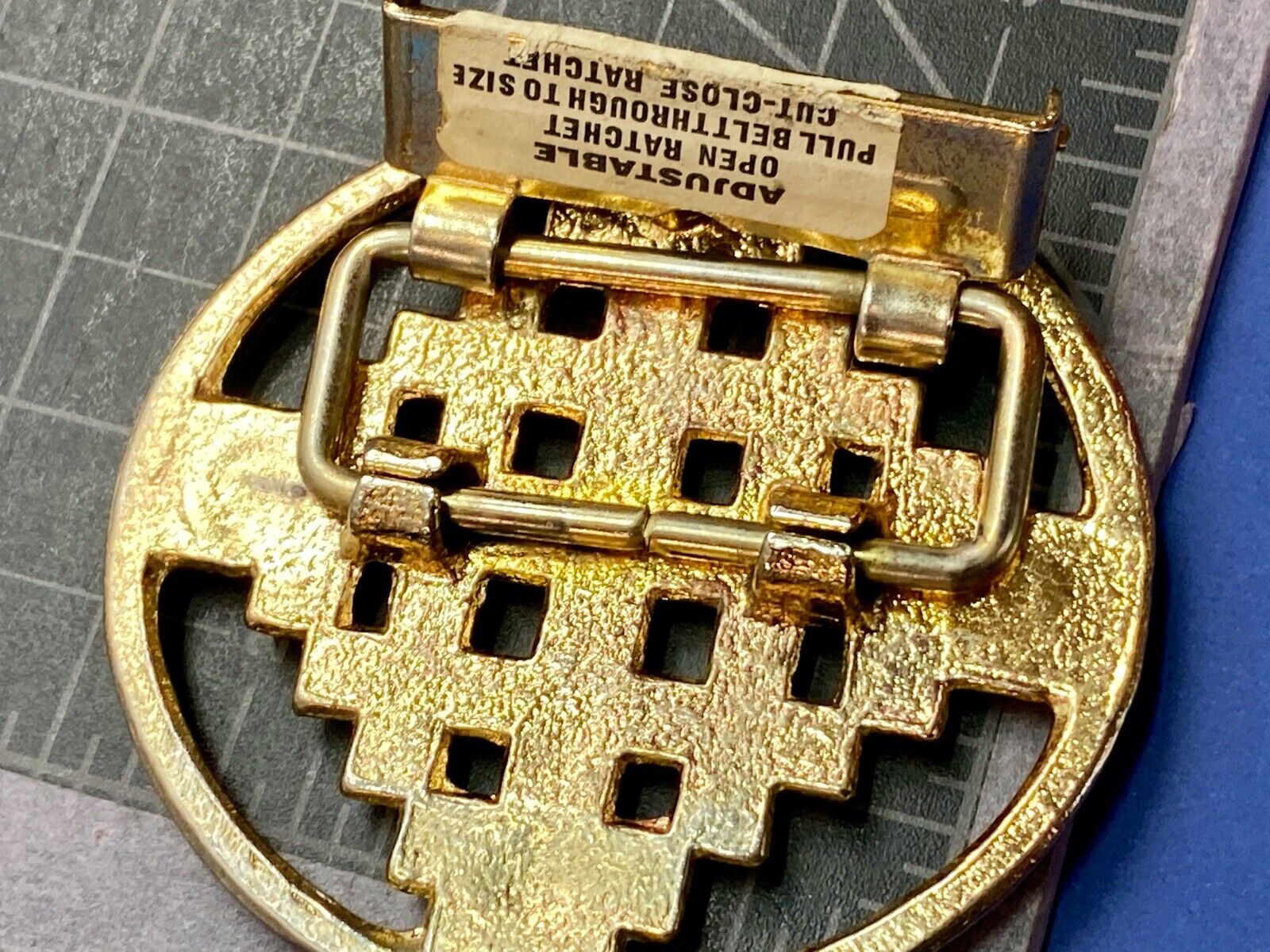 Art Deco squares pattern making up adjustable open ratchet round belt buckle 