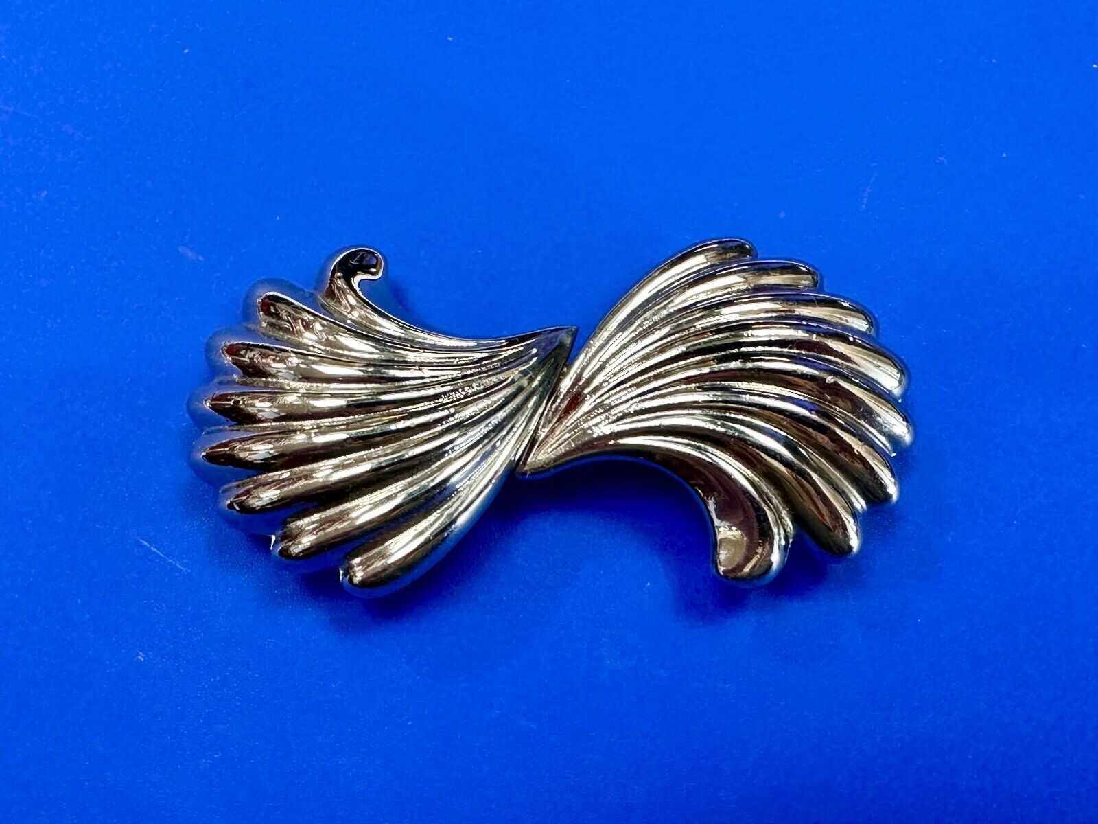 Two-piece interlocking gold color belt buckle by Dotty Smith