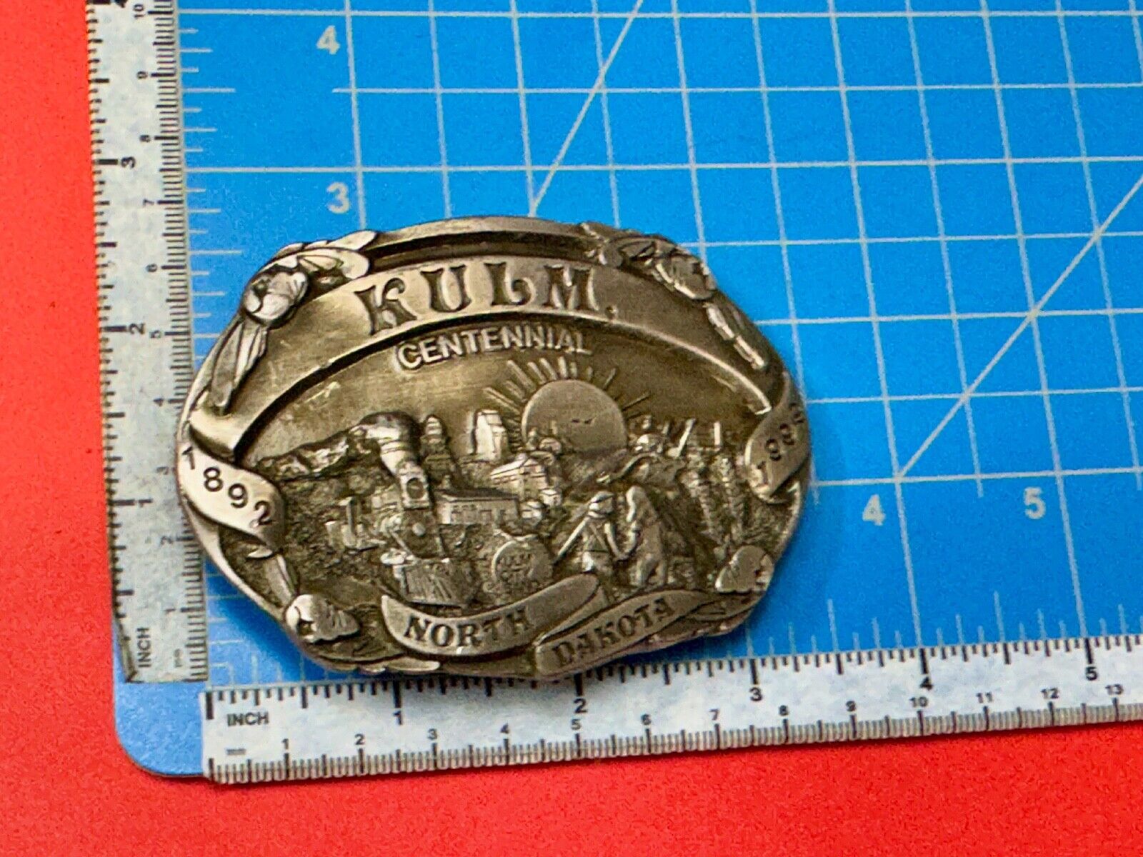 Vintage KULM North Dakota commemorative belt buckle by DART inc.