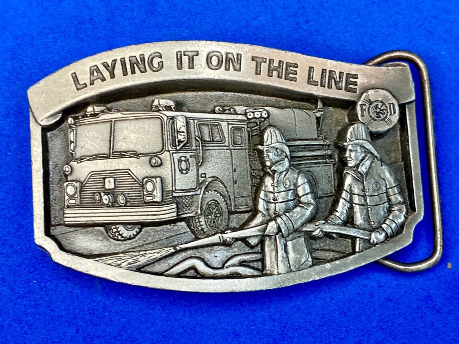 Vintage 1992, Laying it on the line fire department pewter belt buckle 