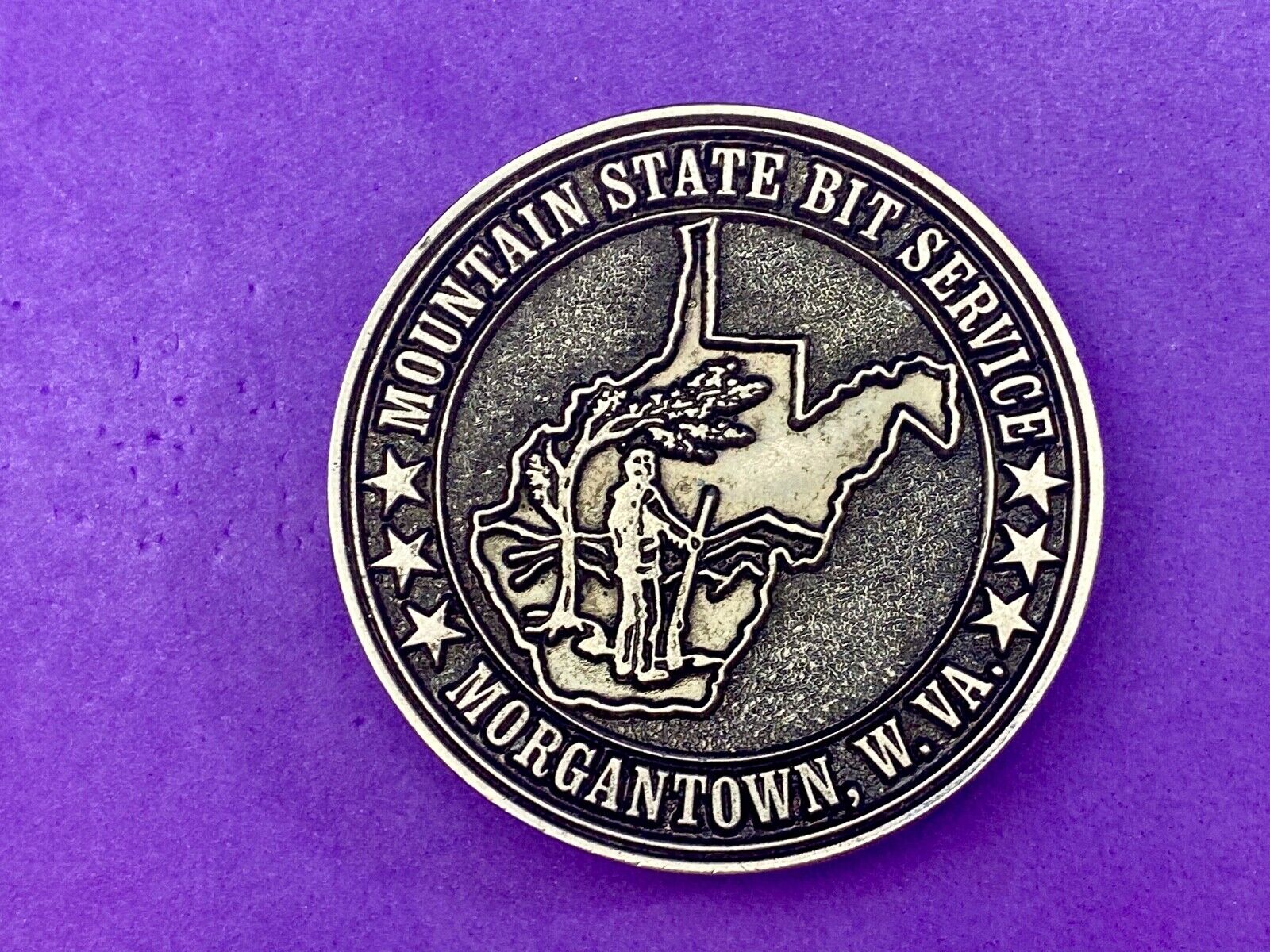 Vintage  Mountain State Bit Services Morgantown W.V. round belt buckle  by Lewis