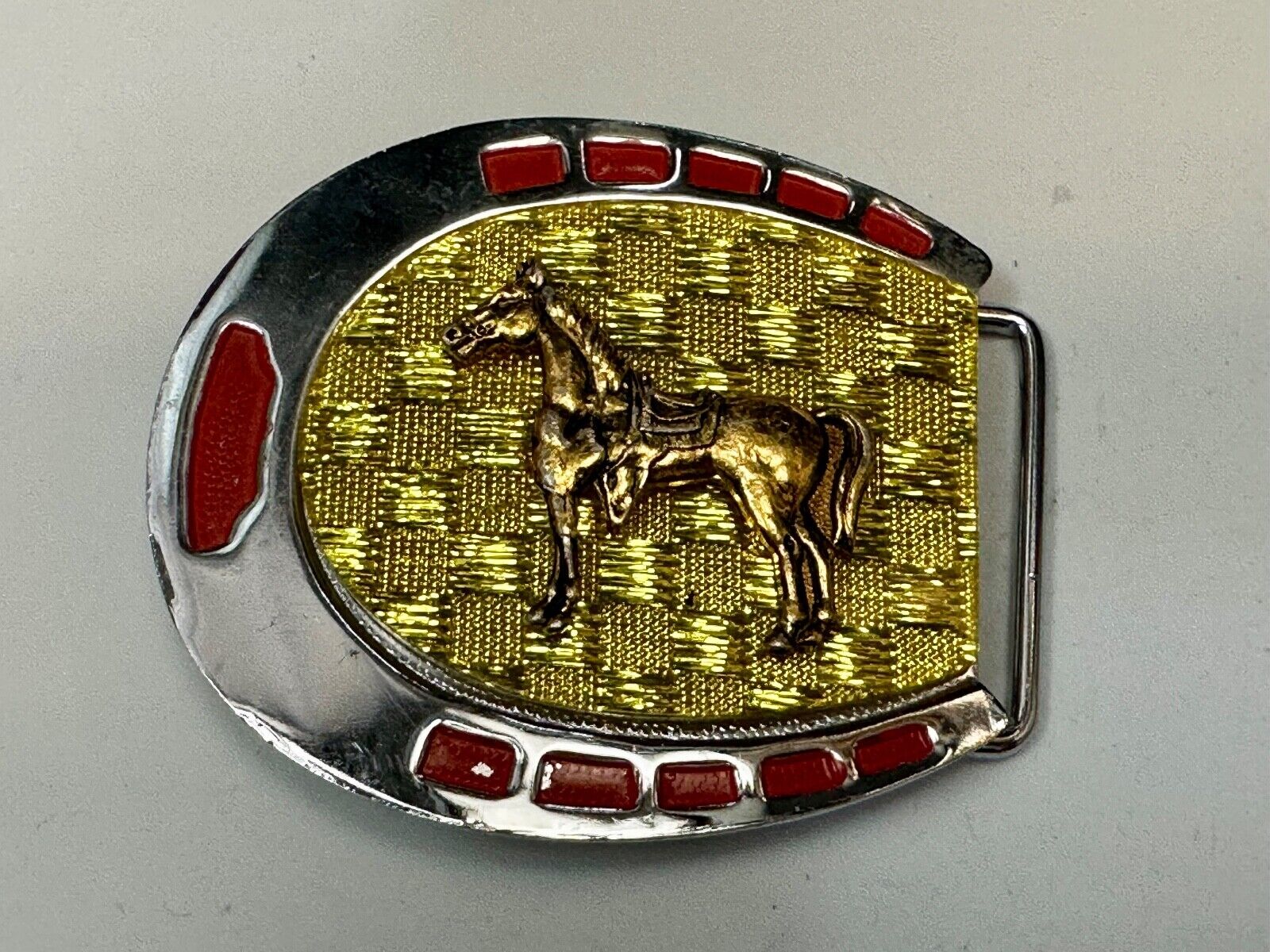 Artisan Resin covered Horseshoe shaped Belt Buckle with gold tone standing horse