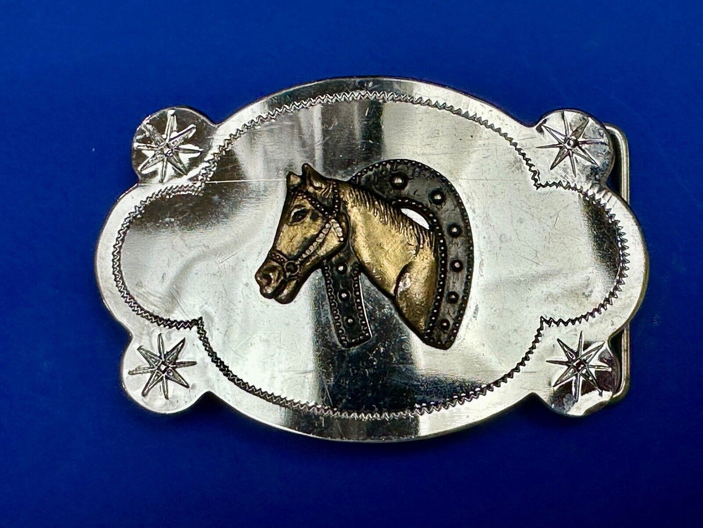 Vintage horse head in horseshoe cowboys cowgirls western belt buckle starbursts