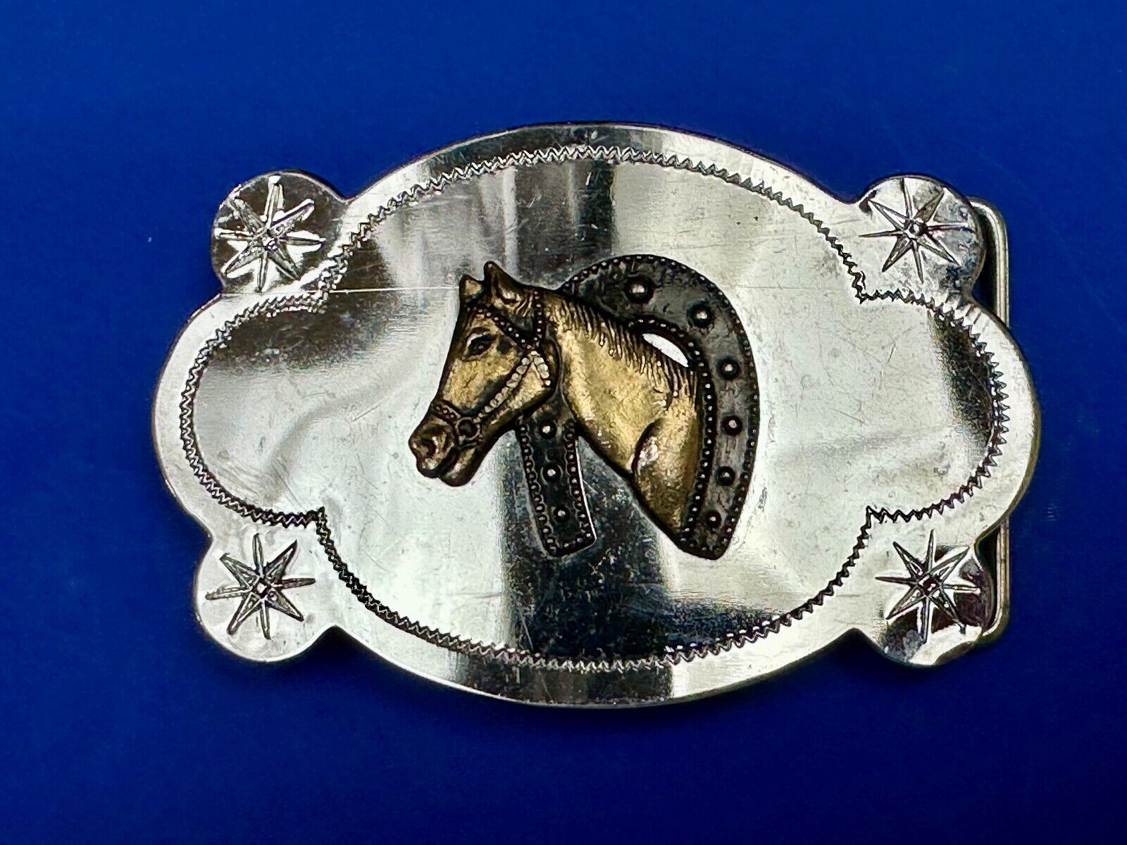 Vintage horse head in horseshoe cowboys cowgirls western belt buckle starbursts