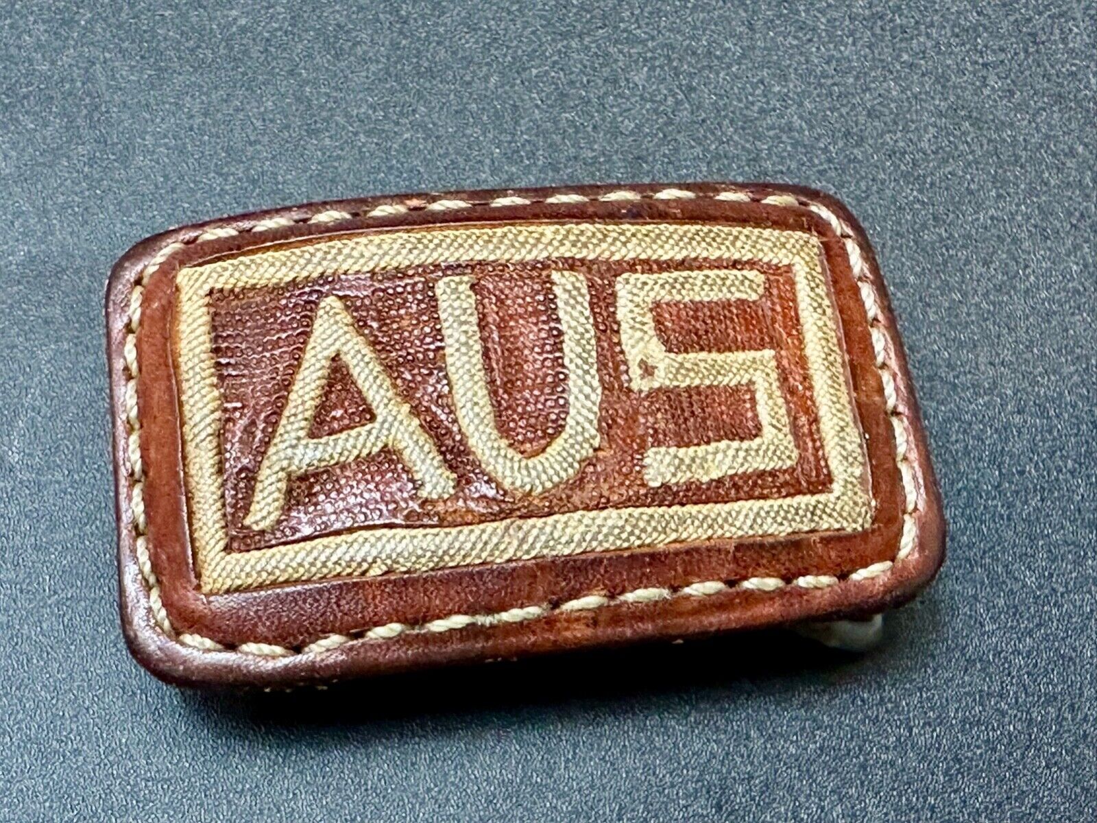 AUS  Brown leather with cream color Stitching  pre loved belt buckle